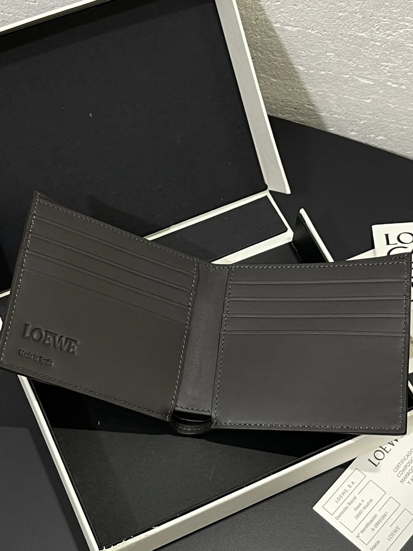 Men's bifold wallet is shipped. The wallet is inspired by the puzzle series handbags. It adopts a unique geometric pattern. It is made of classic calfskin. It has eight card slots and two large pockets. Style number 3801. Size 11*10 💰330