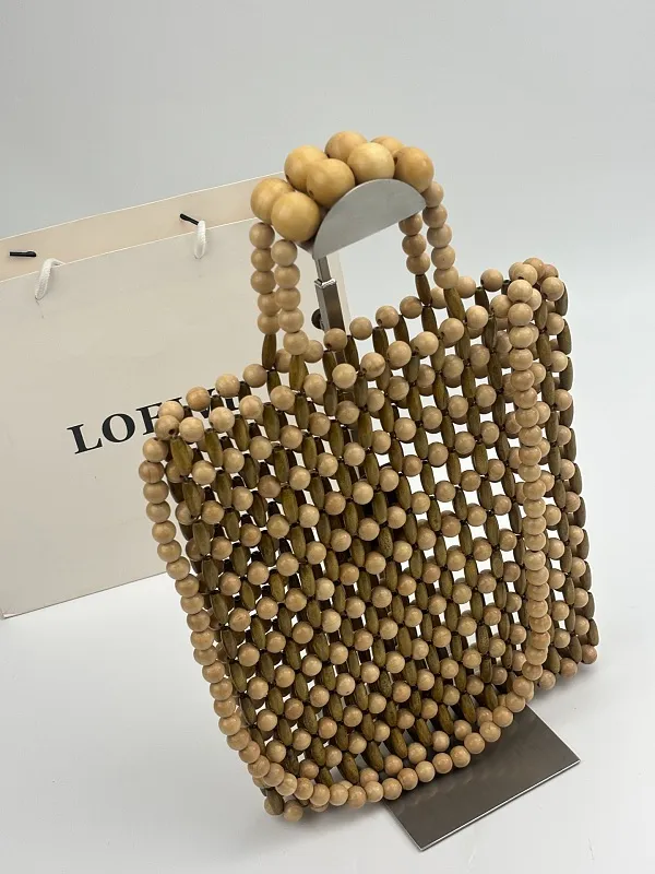All Categories Official Website "Brand Women's Bags" Women's Bags 💙 Loewe 2026 Official Website LOEWE Wooden Beaded Handbags
