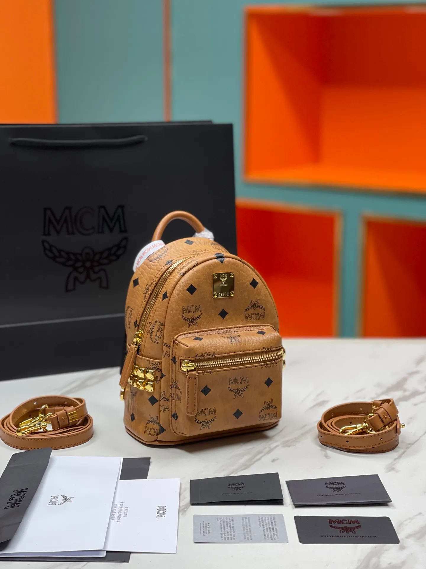 Factory running price 620💰💐Top original quality MCM side stud series [Exclusive real shot] Ultra-mini size coded M9005 piece is made of our signature Visetos coated canvas and lined with luxurious faux leather. The structured design has a spacious interior and pyramid rivet trim to add avant-garde style to your look. Size: The actual super mini size is about 17X21X19