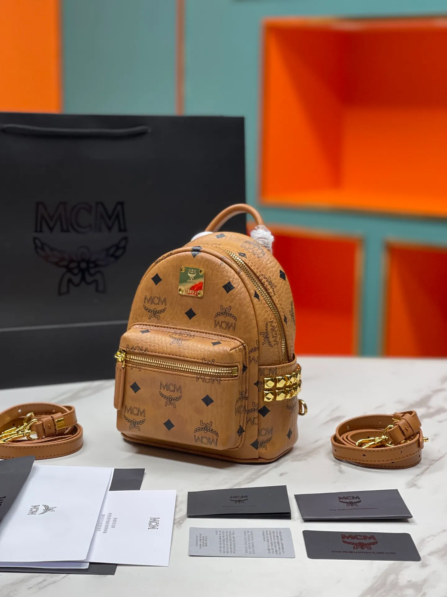 Factory running price 620💰💐Top original quality MCM side stud series [Exclusive real shot] Ultra-mini size coded M9005 piece is made of our signature Visetos coated canvas and lined with luxurious faux leather. The structured design has a spacious interior and pyramid rivet trim to add avant-garde style to your look. Size: The actual super mini size is about 17X21X19