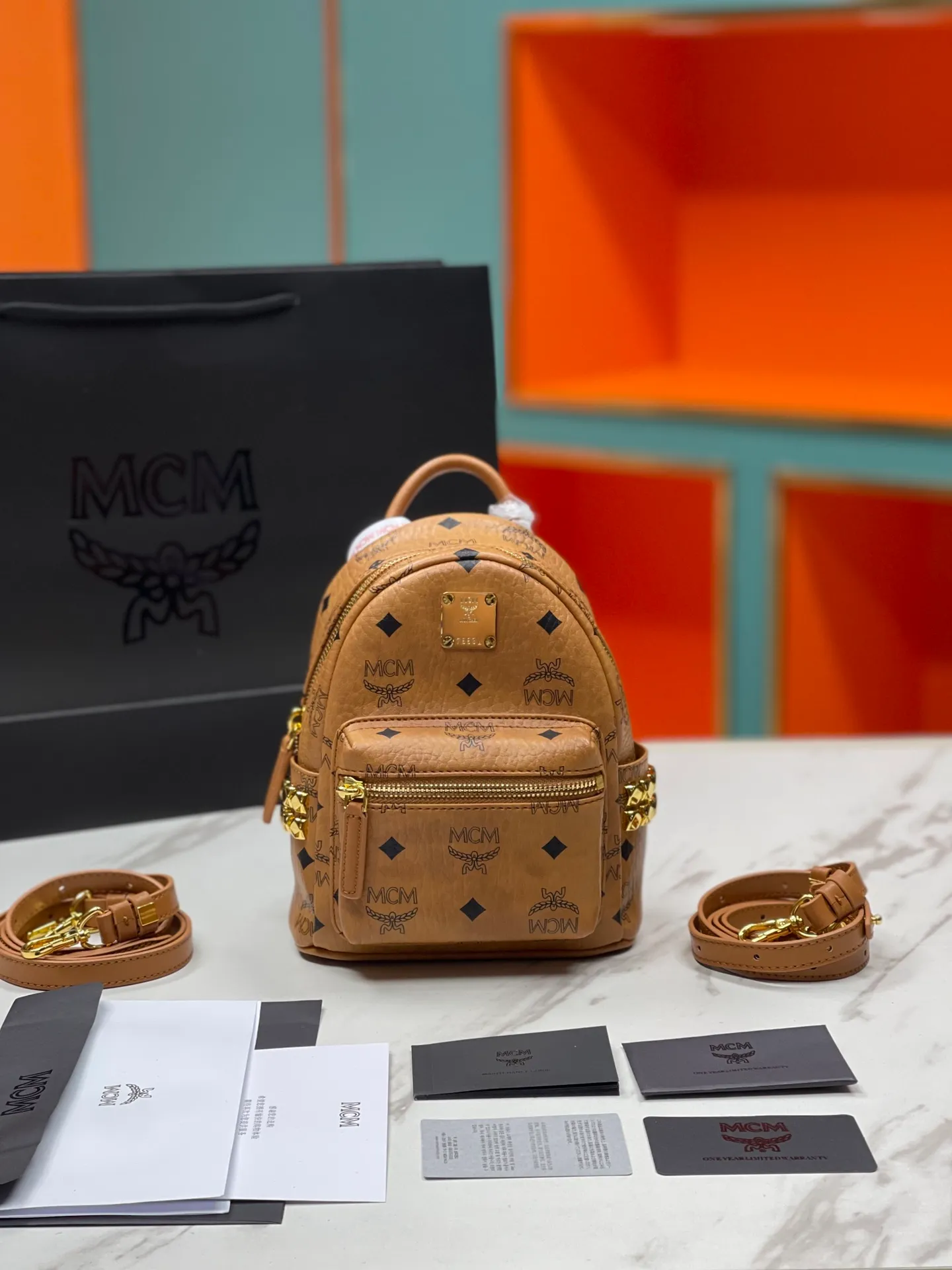 Factory running price 620💰💐Top original quality MCM side stud series [Exclusive real shot] Ultra-mini size coded M9005 piece is made of our signature Visetos coated canvas and lined with luxurious faux leather. The structured design has a spacious interior and pyramid rivet trim to add avant-garde style to your look. Size: The actual super mini size is about 17X21X19