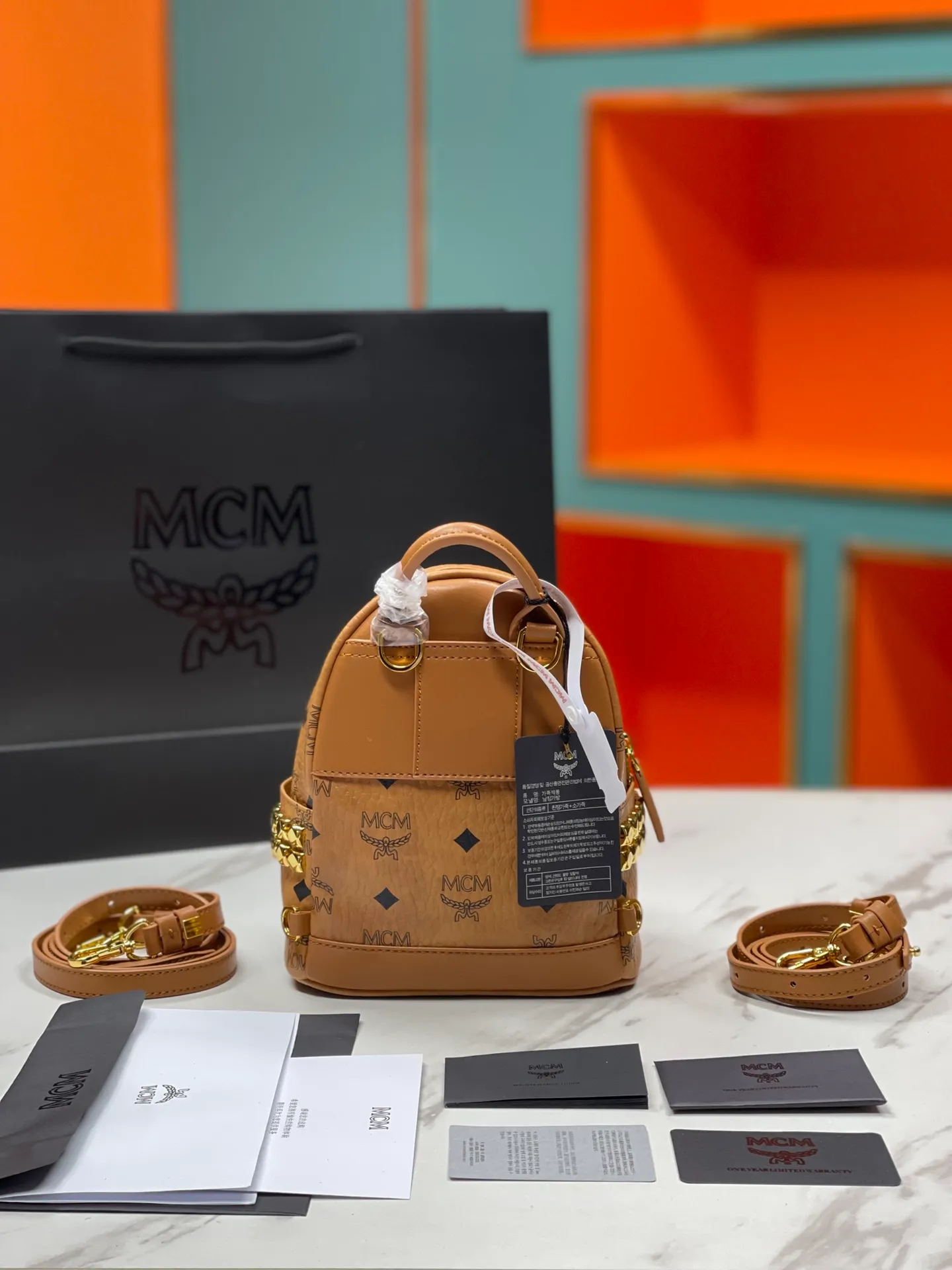 Factory running price 620💰💐Top original quality MCM side stud series [Exclusive real shot] Ultra-mini size coded M9005 piece is made of our signature Visetos coated canvas and lined with luxurious faux leather. The structured design has a spacious interior and pyramid rivet trim to add avant-garde style to your look. Size: The actual super mini size is about 17X21X19