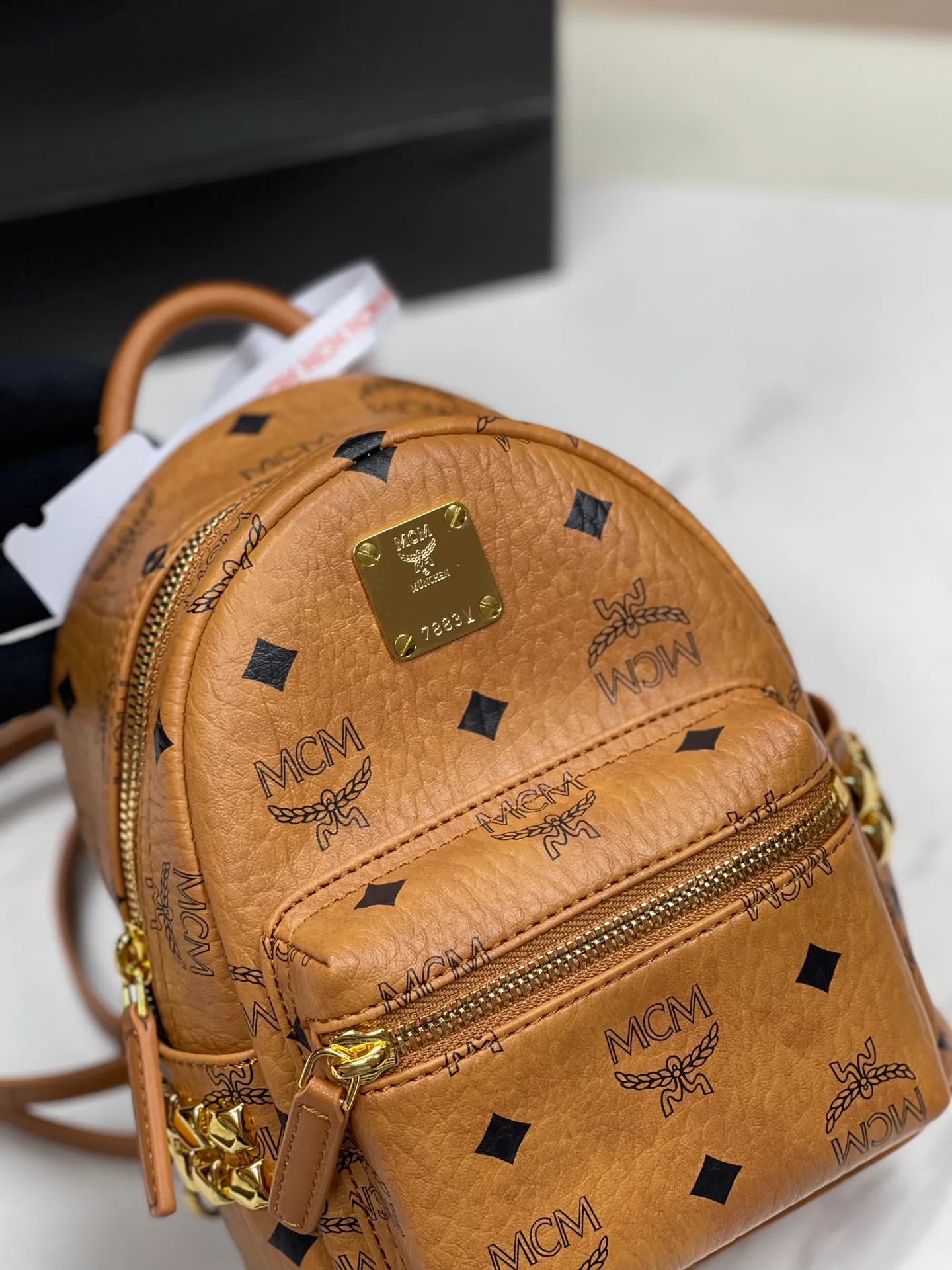 Factory running price 620💰💐Top original quality MCM side stud series [Exclusive real shot] Ultra-mini size coded M9005 piece is made of our signature Visetos coated canvas and lined with luxurious faux leather. The structured design has a spacious interior and pyramid rivet trim to add avant-garde style to your look. Size: The actual super mini size is about 17X21X19