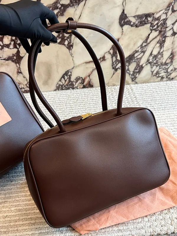 All categories Official website "Brand Women's Bags" Women's Bags 💙 miumiu 2026 new MIUMIU bowling bag