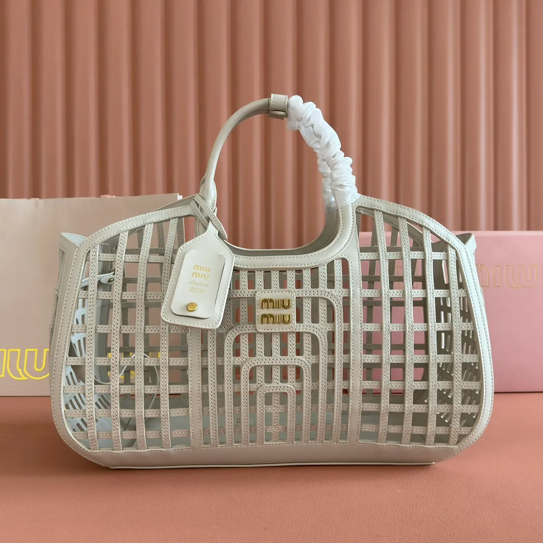 p2560💋💋💋【Full set of packaging at the counter】5BA293MIUMI^ A girl's summer encounter, meet the best version of yourself with a bag. This summer, the romance and rebellion of the limited new vegetable basket are still exciting. The soft hollow calfskin mesh pattern combines retro charm and modern style, making it an ideal choice for summer! Large size: base length 40x height 21x width 15.5cm