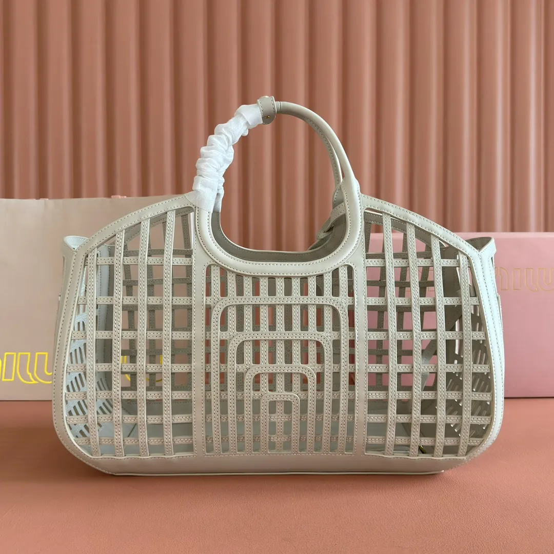 p2560💋💋💋【Full set of packaging at the counter】5BA293MIUMI^ A girl's summer encounter, meet the best version of yourself with a bag. This summer, the romance and rebellion of the limited new vegetable basket are still exciting. The soft hollow calfskin mesh pattern combines retro charm and modern style, making it an ideal choice for summer! Large size: base length 40x height 21x width 15.5cm