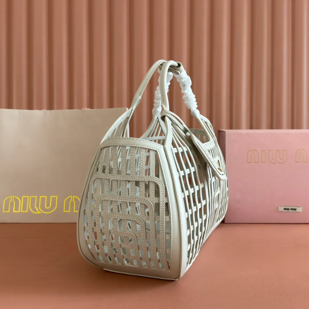 p2560💋💋💋【Full set of packaging at the counter】5BA293MIUMI^ A girl's summer encounter, meet the best version of yourself with a bag. This summer, the romance and rebellion of the limited new vegetable basket are still exciting. The soft hollow calfskin mesh pattern combines retro charm and modern style, making it an ideal choice for summer! Large size: base length 40x height 21x width 15.5cm