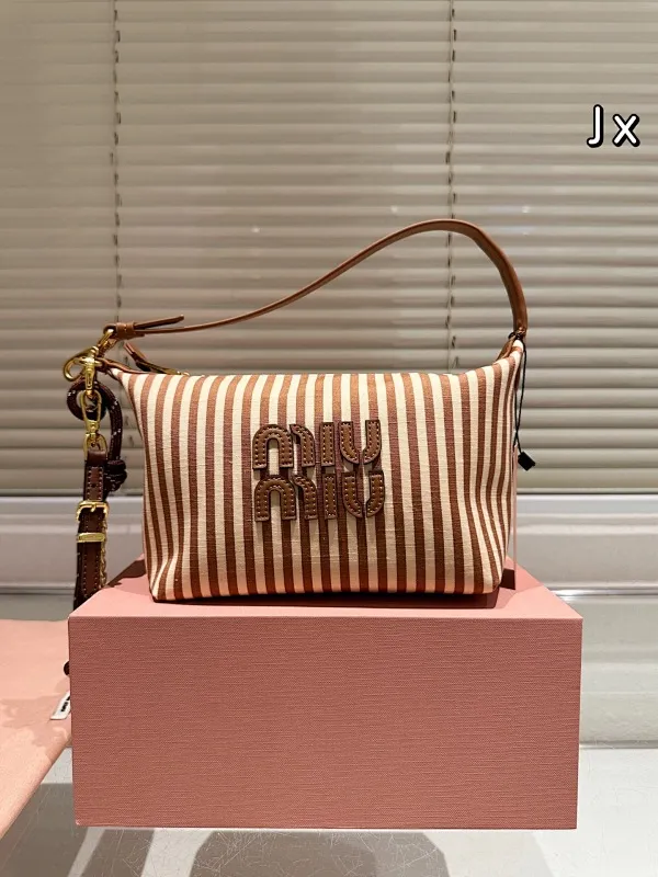 All categories Official website "Brand Women's Bags" Women's Bags 💙 miumiu 2025 new miumiu lunch box bag