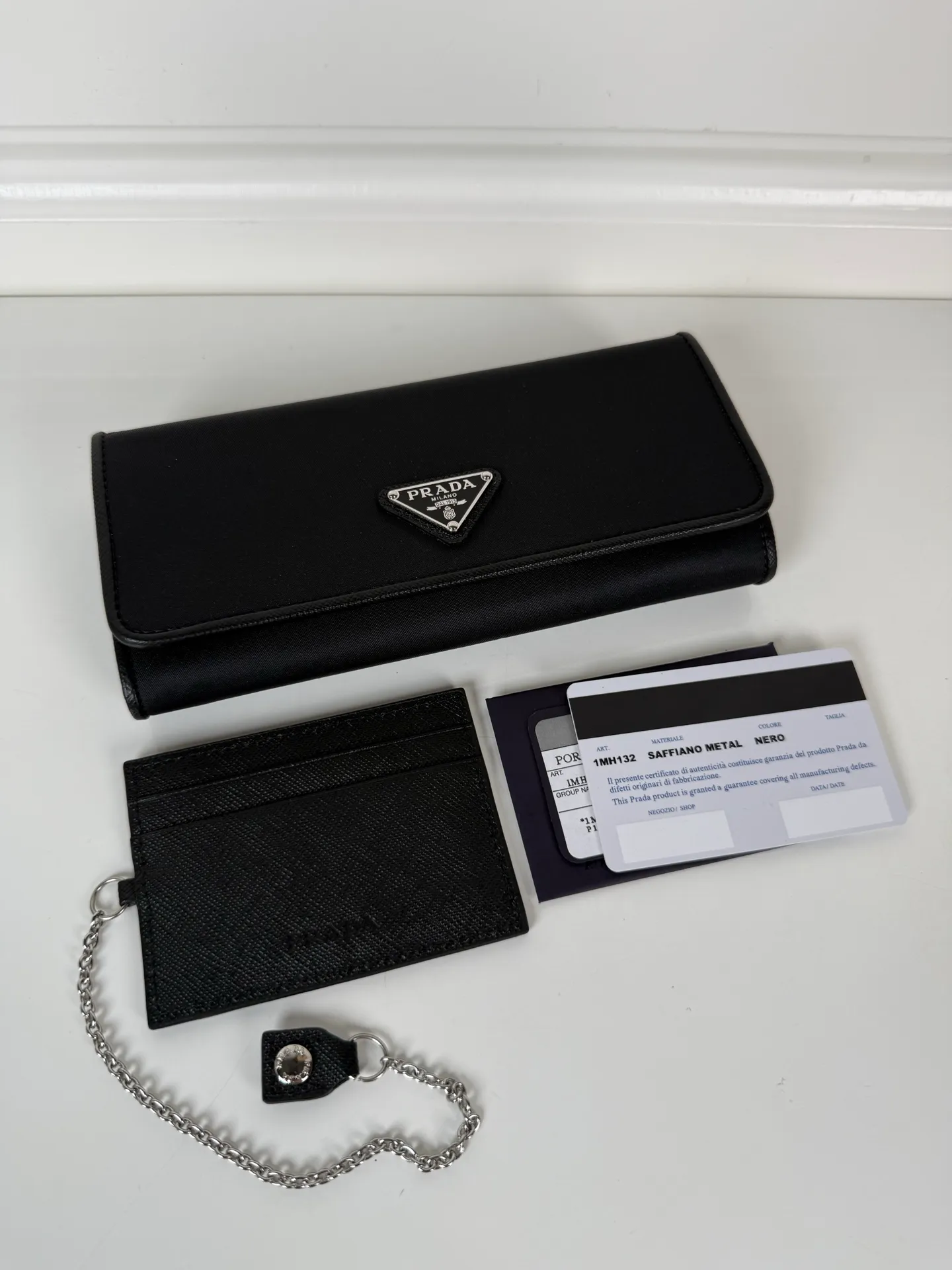 💰560, P Home ➡️Ladies flip wallet, model 1MH132, black, made of imported cross-grain cowhide + nylon fabric, original quality, size 18.7x9.5cm, taken in kind, what you see is what you get
