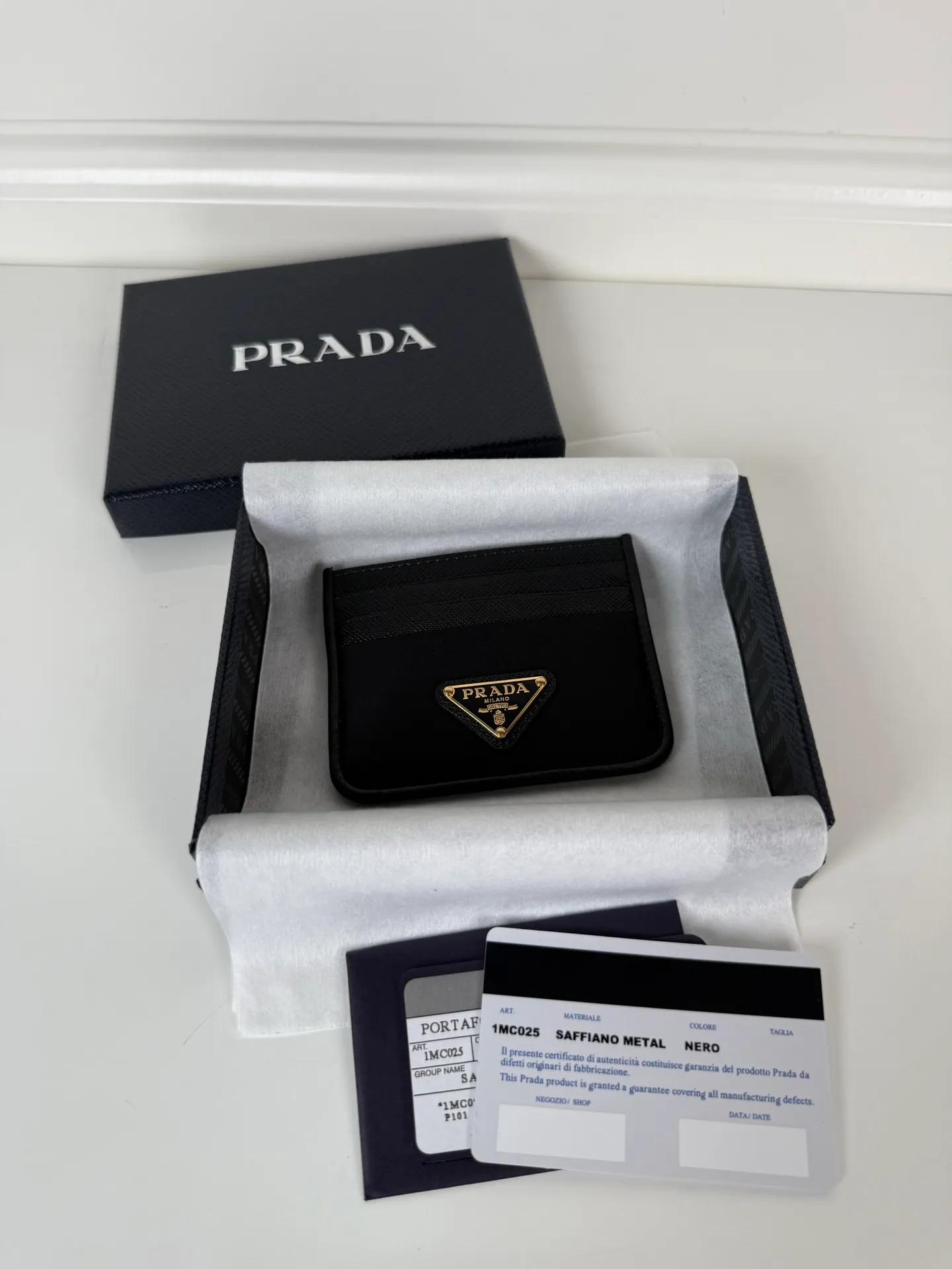 💰300, P Home ➡️ Unisex small card holder, model 1MC025, original quality, imported cross pattern + nylon fabric, 6 card slots ➕ one middle sandwich, can hold multiple cards and zeros 💰, size 11.2×8.5cm, taken in kind, what you see is what you get