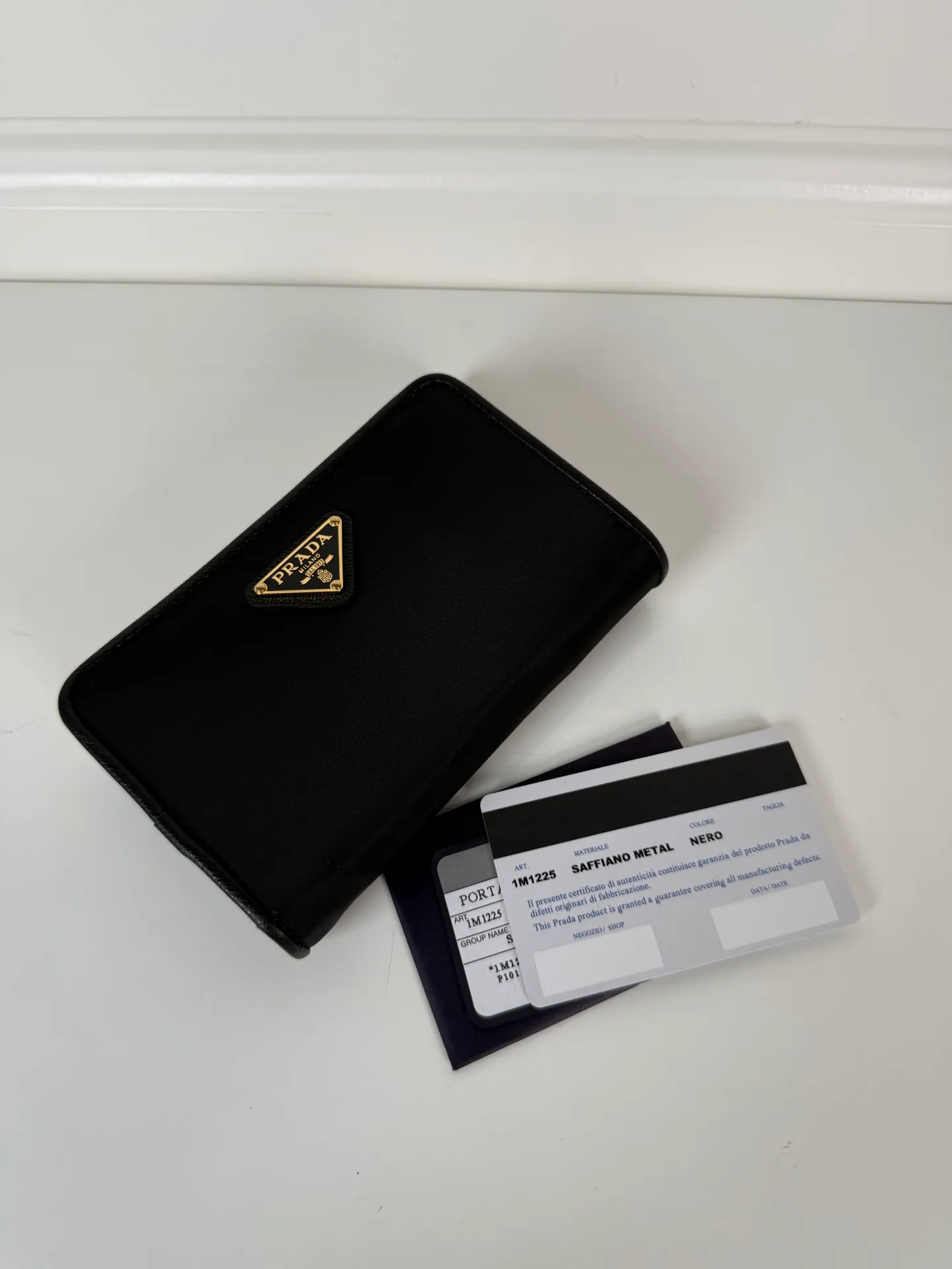 💰520, P Home➡️Women's short clip made of cross pattern + nylon fabric, single quality, model 1M1225, ten card slots, two ID pockets, a zippered zero 💰 bag interlayer, size 14x9.5cm.
