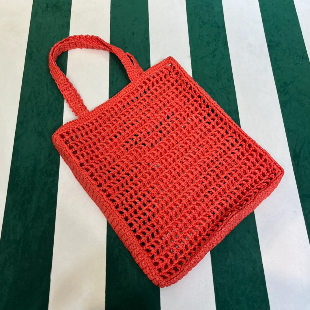💰1160 Raffia Upgraded Version/Shrimp Orange🦐 𝗣𝗿'𝗮𝗱𝗮Raffia Fiber Tote Bag Made of high-quality imported raffia🌿 Purely handmade! Every craftsman makes it with care and crochets it stitch by stitch! How can summer outings, picnics, and photo shoots be complete without a beautiful, lightweight and chic straw bag? 393 Size: 36×4×38cm