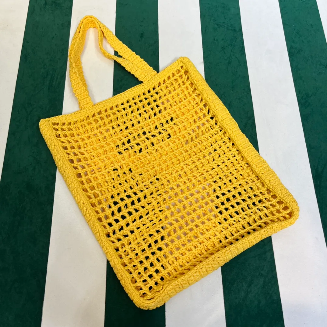 💰1160, upgraded version of raffia/yellow🌼 𝗣𝗿'𝗮𝗱𝗮raffia fiber tote bag. Made of high-quality imported raffia🌿 purely handmade! Every craftsman makes it with care and crochets it stitch by stitch! How can summer outings, picnics, and photo shoots be complete without a beautiful, lightweight and chic straw bag? 393 Size: 36×4×38cm