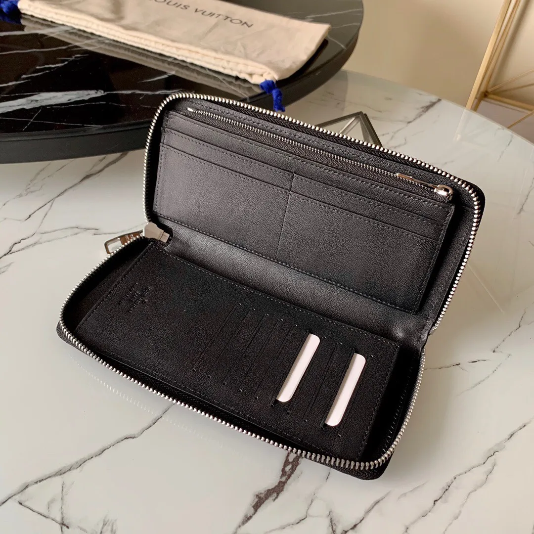 P¥420👉nfc dynamic chip version👈【Top original pure steel hardware】💕 M58412 black pebbled men's zipper bag This Zippy Wallet Vertical straight zipper wallet can accommodate cash, cards and change, and the design is both fashionable and practical. It has multiple pockets and compartments. The soft and tough Taurillon leather makes it even more attractive ex-factory price.  Details 10 x 20 x 2 cm (Length x Height x Width) Taurillon leather Cowhide lining Silver hardware 12 credit card slots 2 business card pockets 1 large accordion compartment for banknotes 1 zippered coin compartment 1 compartment for IDs and receipts