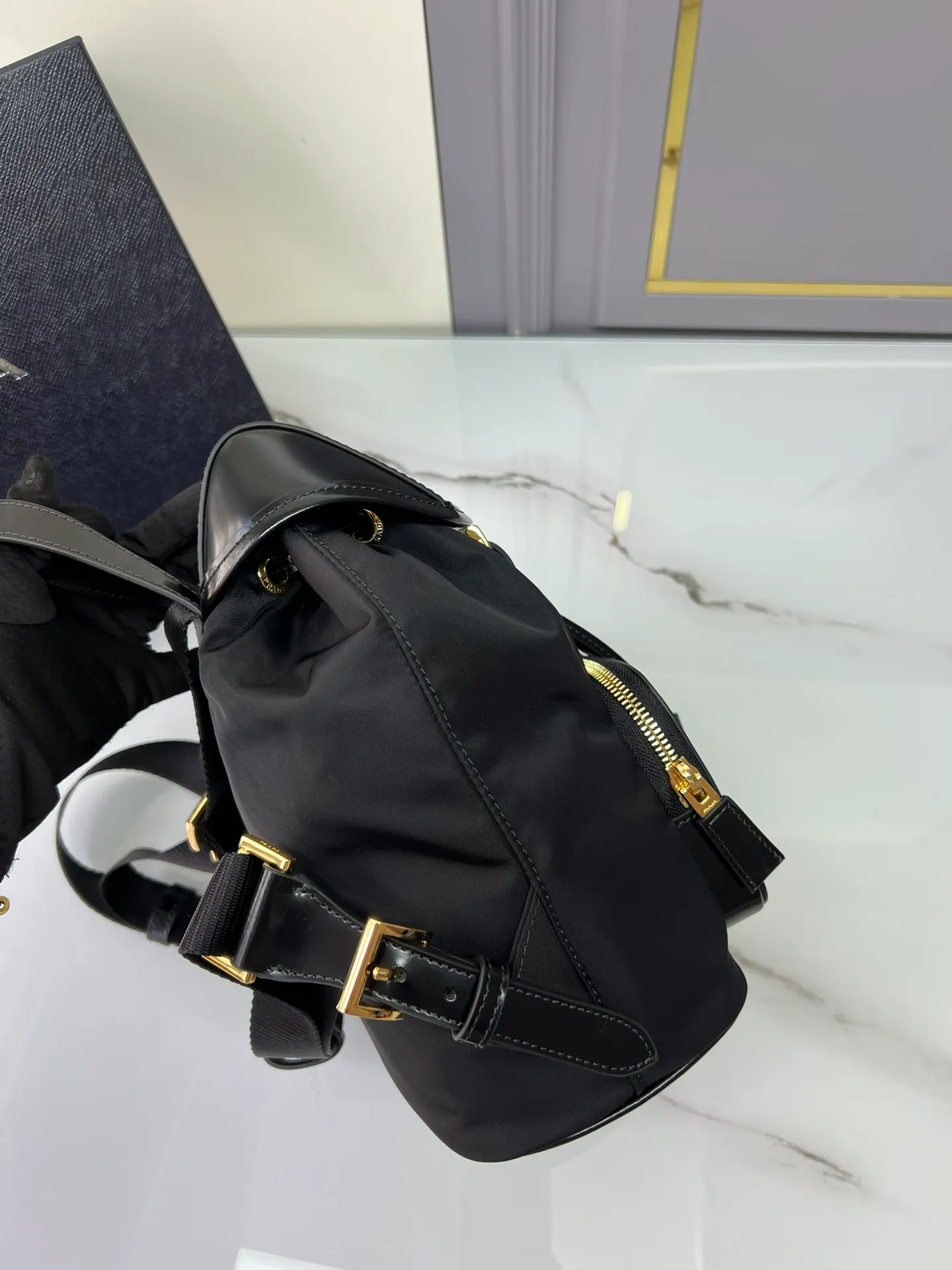 💰1260, this backpack combines several elements, imported nylon fabric and glossy cowhide 🎉Top metal hardware accessories. Elegant and versatile, it features an exterior zip pocket and is embellished with the signature enameled triangle metal logo. Another backpack that will never go out of style. beauties. Hurry up and get it🎉🎉 Length 20.5x Height 25x Bottom 11.5cm🎁