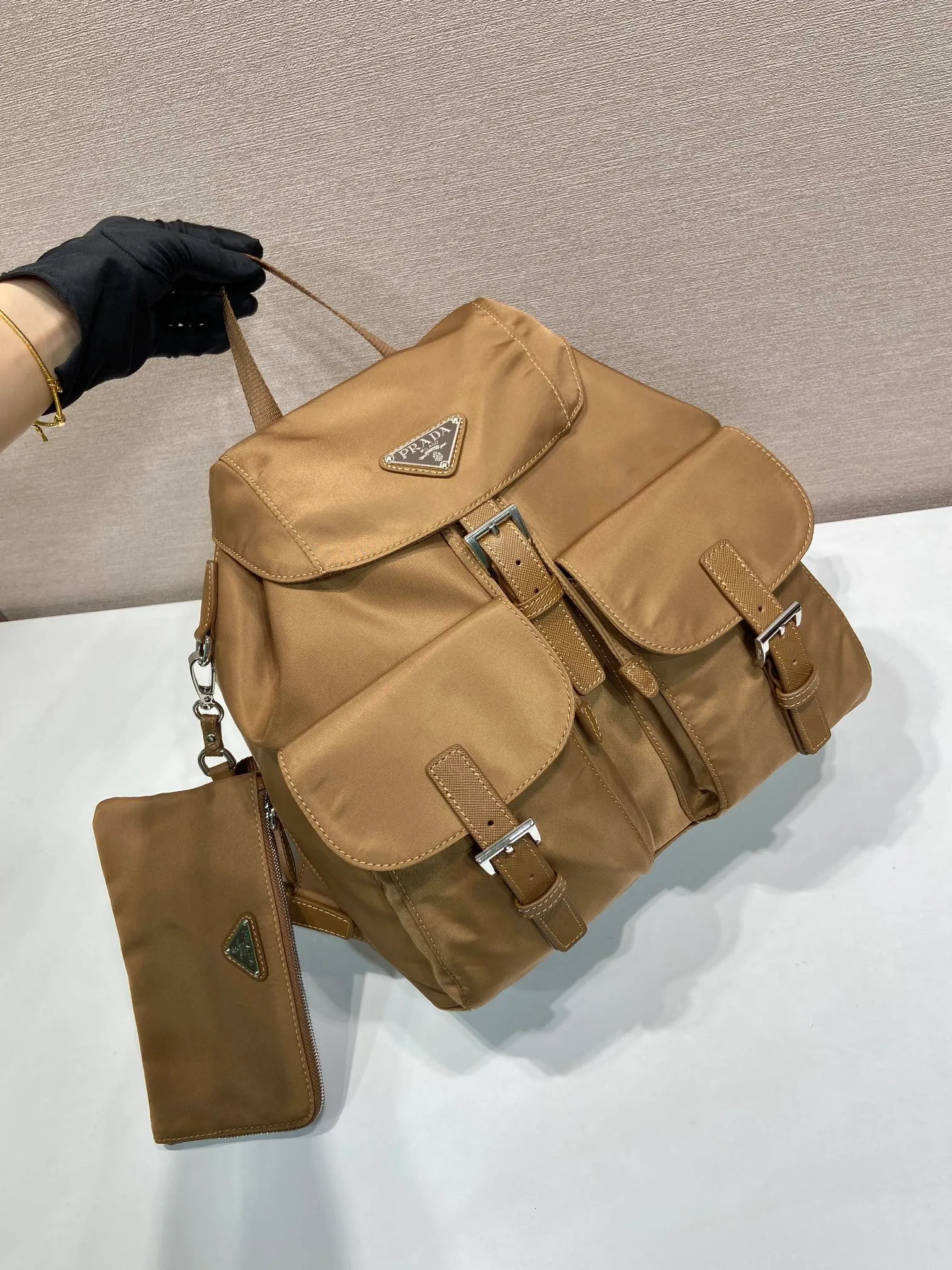💰1120🎉New Backpack🎉1BZ811👍👍This nylon backpack is trimmed with exquisite Saffiano leather, a blend of multiple materials, and decorated with a triangle logo, highlighting fashionable elegance. It also comes with a detachable small handbag😘😘Light and practical, the upper body effect is super stylish, and it can be matched at will😘😘Fully upgraded nylon fabric👍👍Length 30x Height 32x Bottom 15cm👏👏👏💰💰💰