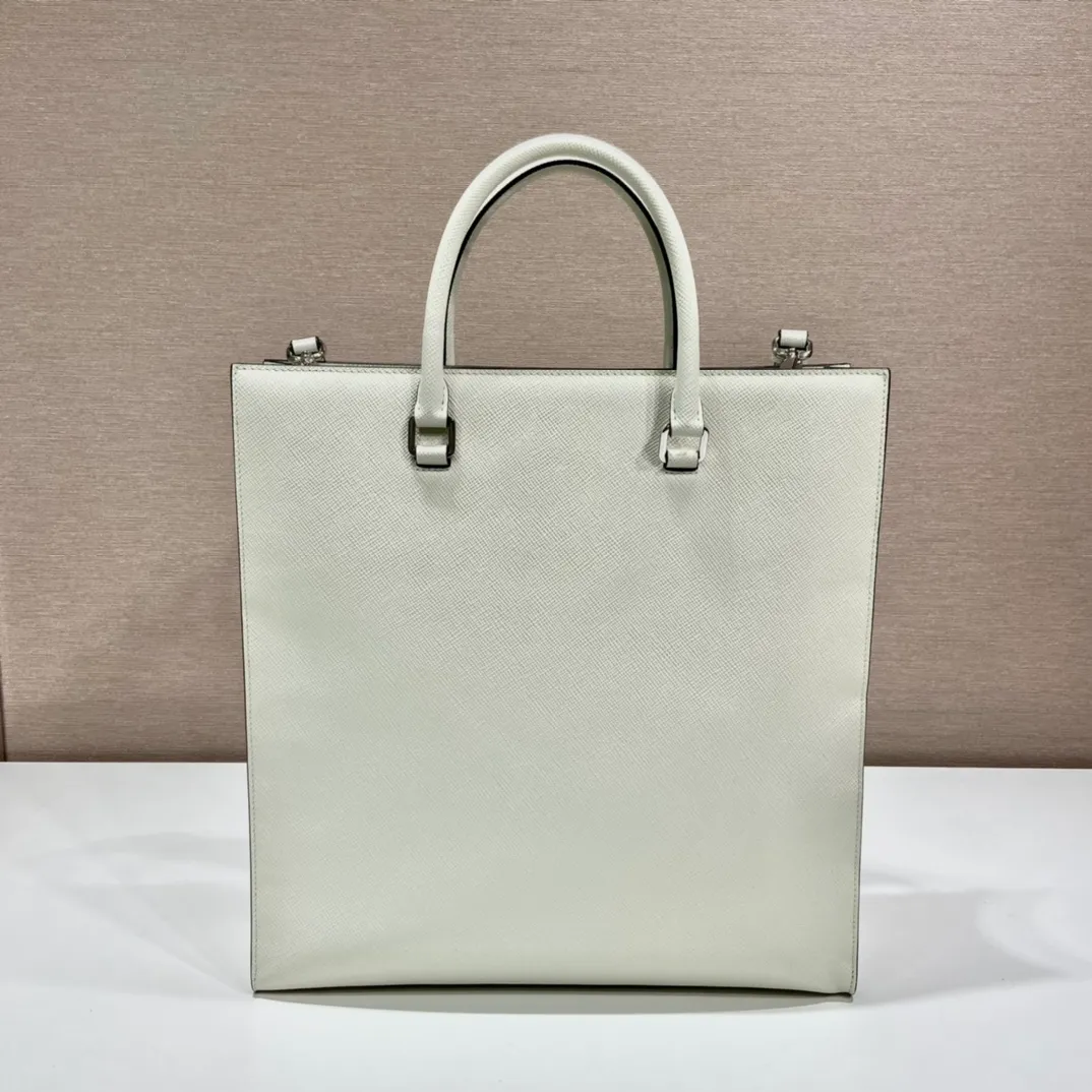 💰2040🎉Embroidered webbing tote bag🎉2VG084🎉🎉New color🎉🎉 This stylish and simple tote bag is made of imported Saffiano leather, with a large embossed logo and unique cross parallel lines. My favorite is this detachable embroidered webbing, which can also be matched with other bags🎉🎉Simple and elegant, fashionable, full of street fashion👏👏 Length 37x Height 37x Bottom 9cm