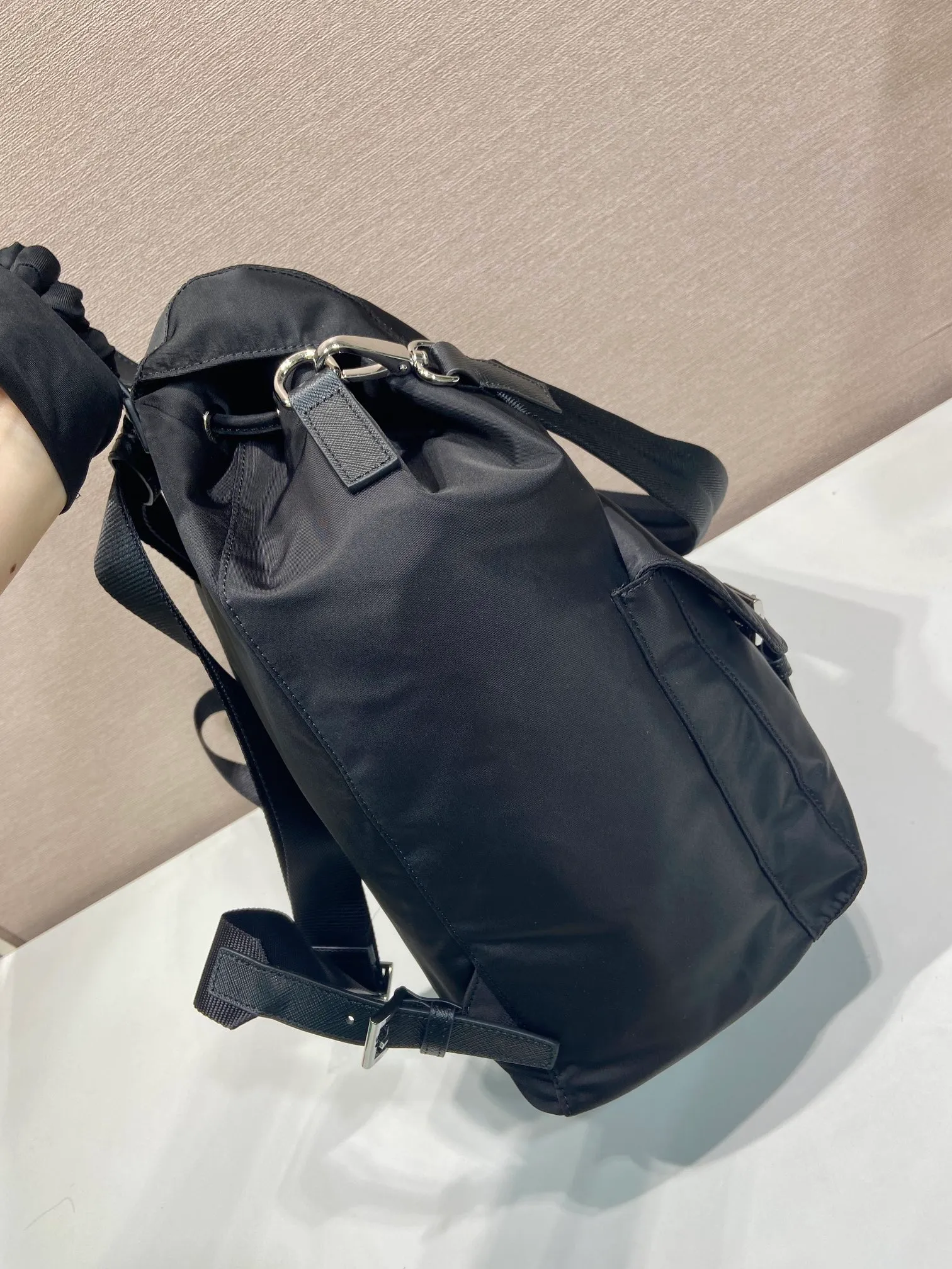 💰1360🎉New Backpack🎉2VZ110A Double Shoulder Strap🎉🎉 This Re-Nylon backpack is designed with classic nylon fabric, top-grade hardware, and integrated with innovative and practical elements, presenting a refined and timeless style. Equipped with a detachable shoulder strap, it can be used interchangeably on different occasions. The upper body effect is very fashionable and elegant, and it is a popular style that will never go out of style🎉Hurry up and get it🎉🎉 Length 34x Height 39x Bottom 15cm🎉🎉🎉🎉👏👏👏