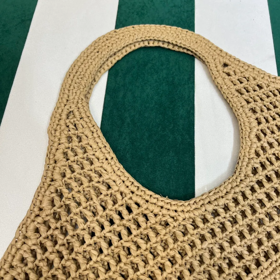 💰1360{Apricot｝🏝 Prad* new hollow straw tote! Full of artistic atmosphere ~ The raffia weave is very solid and has a great texture. ♡ It can be paired with personal clothes every day. The natural style design makes it seem like it can breathe💭 If you like the baby, quickly add it to the harem. Carry an exclusive style that will not go out of style for several years🌱1BG424 Size: Height 45x Width 51cm