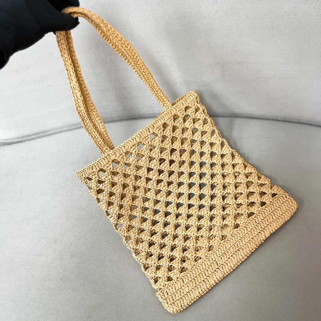 💰1360, new raffia beach bag 1BG493, an excellent choice for travel and vacation🏖️Handmade with raffia, the light and natural material expresses summer mood. Embroidered lettering triangle logo on the front, with long exquisite shoulder handles. Super large capacity and very light weight. Wear-resistant, waterproof, durable and good-looking. Can be carried by hand, shoulder or shoulder. New favorite of fashion trendsetters. Perfect details. Comparable to brick cabinets. Excellent 5🌟 evaluation Size: 30*29.5cm