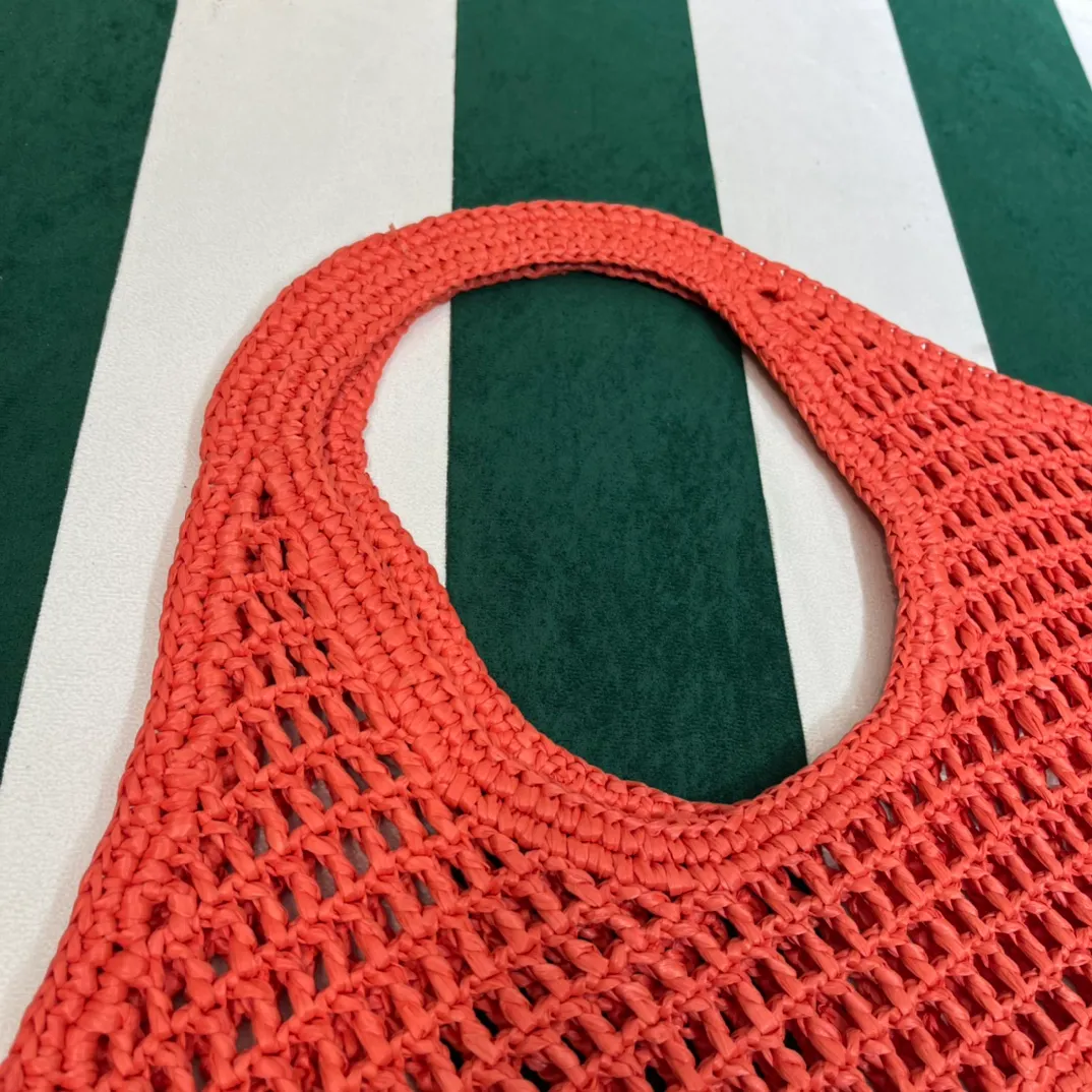 💰1360{Shrimp Orange｝🦐 Prad* new hollow straw tote! Full of artistic atmosphere ~ The raffia weave is very solid and has a great texture. ♡ It can be paired with personal clothes every day. The natural style design makes it seem like it can breathe💭 If you like the baby, quickly add it to the harem. Carry an exclusive style that will not go out of style for several years🌱1BG424 Size: Height 45x Width 51cm