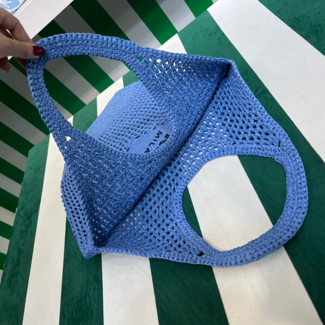 💰1360{Blue｝🦋 Prad* new hollow straw tote! Full of artistic atmosphere ~ The raffia weave is very solid and has a great texture. ♡ It can be paired with personal clothes every day. The natural style design makes it seem like it can breathe💭 If you like the baby, quickly add it to the harem. Carry an exclusive style that will not go out of style for several years🌱1BG424 Size: Height 45x Width 51cm
