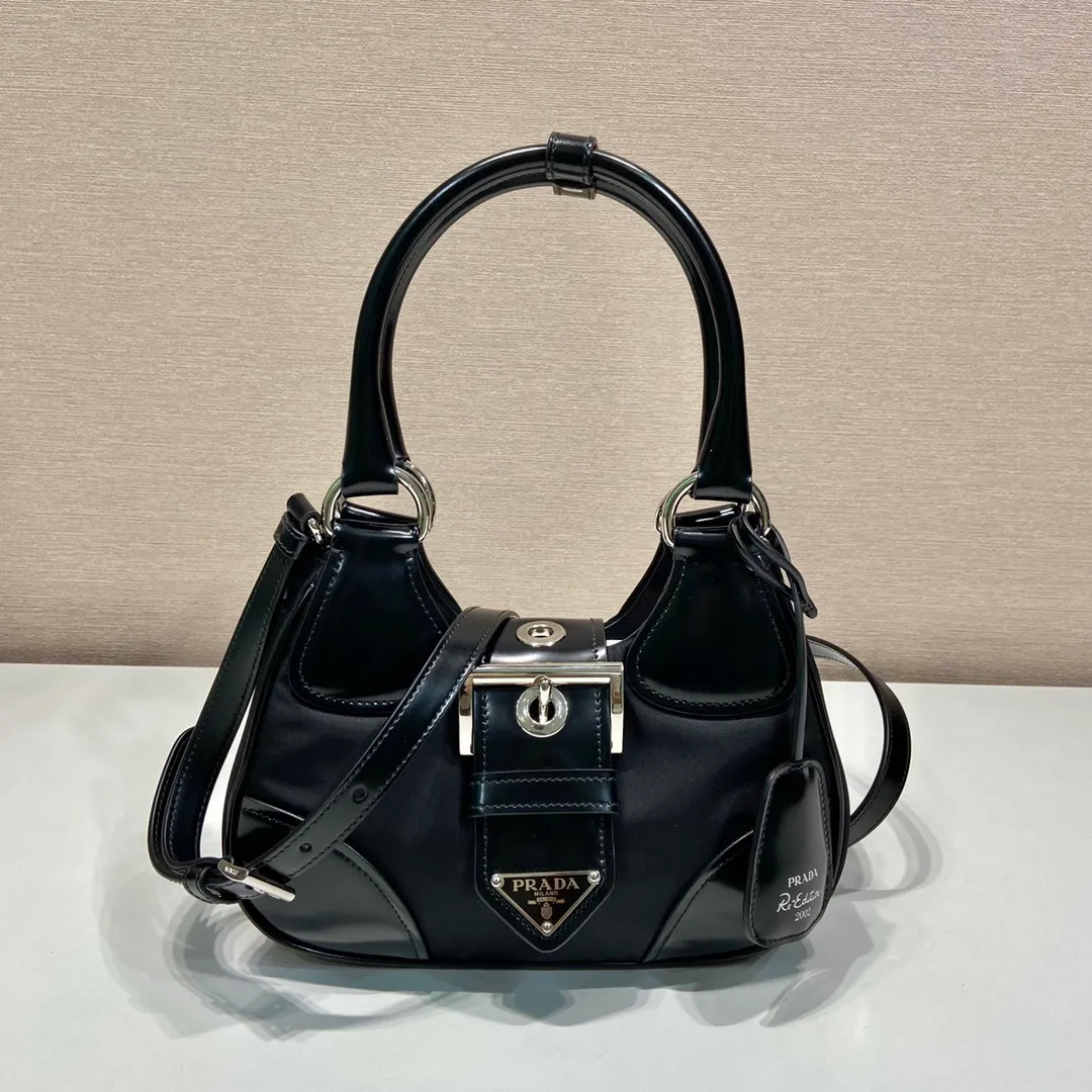 💰1320🎉Moon handbag🎉1BA381 new model🎉🎉 This Moon handbag is made of imported nylon fabric and glossy cowhide design. It is equipped with a 100 cm detachable and adjustable leather long shoulder strap, which can be carried by hand or on the shoulder, a detachable leather keychain, and a triangle logo magnetic buckle/lace closure on the front. It is lightweight and practical, and has a cool/fashionable upper body effect. Another popular style that will never go out of style🎉🎉Hurry up and get it🎉 Length 22.5x Height 16x Bottom 7.5cm