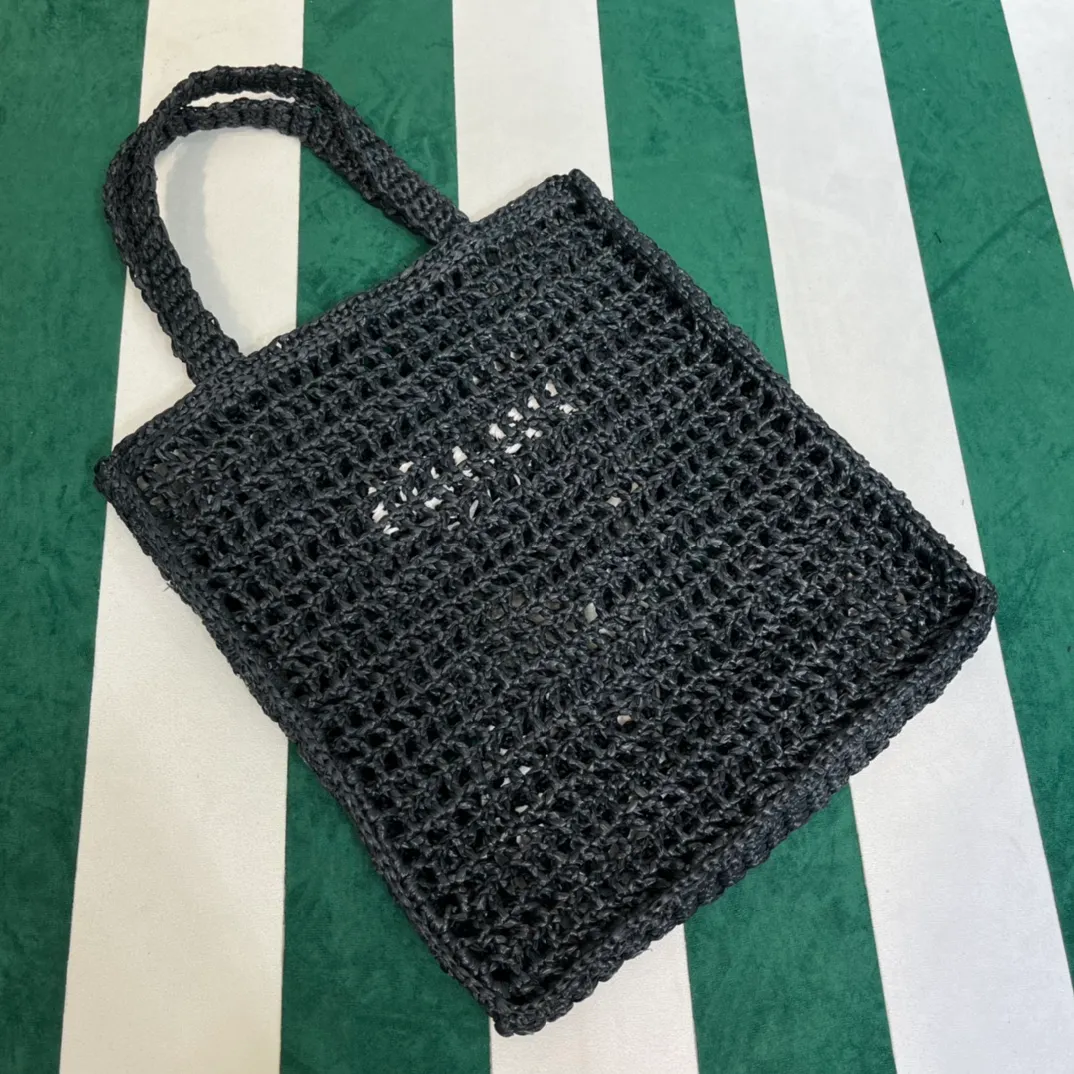 💰1160 Raffia Upgraded Version/Black🎱 𝗣𝗿'𝗮𝗱𝗮Raffia Fiber Tote Bag Made of high-quality imported raffia🌿 Purely handmade! Every craftsman makes it with care and crochets it stitch by stitch! How can summer outings, picnics, and photo shoots be complete without a beautiful, lightweight and chic straw bag? 393 Size: 36×4×38cm