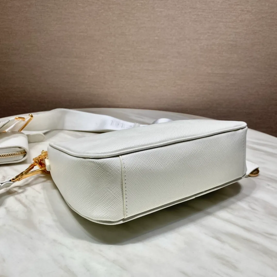 💰1500🎊Gold hardware three-in-one🎊New color 1BH204 full leather/gold hardware, nylon Hobo hand/armpit bag😘😘The full leather hobo that is popular in the fashion circle due to the crazy cultivation of the Internet celebrity sister group has a new model! 👏👏The design of this all-leather Hobo bag is great👍👍One bag with three uses😘😘waist bag/crossbody/single shoulder bag👍👍The handle is replaced by a chain, which makes the underarm bag a little more sexy. It also has a long shoulder strap. What I love most is that there is a small pendant (small bag) hanging on the shoulder strap, which can also be hung on other bags and pants as accessories. 🙊🙊There is no problem in matching various clothes in normal times😘😘Babies, hurry up and get it, it’s so beautiful🙊🙊Dimensions: length 23x height 17x bottom 6.5cm👏👏👏💰💰💰