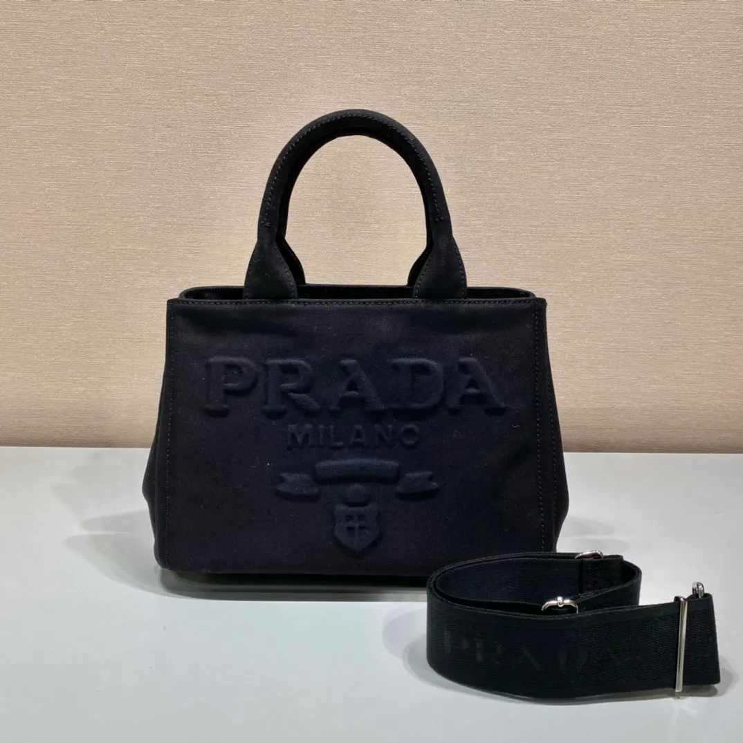 💰1120🎉New three-dimensional large character mark🎉1BG439🎉🎉 This retro-style handbag is made of fabric, with a concave and convex three-dimensional large character mark design on the front, which looks particularly novel🎉🎉Triangular logo on the side and decorated with copper accessories, double fabric handles, detachable and adjustable fabric shoulder straps, top hardware accessories, simple and elegant, large space🎉🎉Retro classic is another popular style that will never go out of style🎉🎉 Length 28x Height 20x Bottom 15cm🎉🎉🎉💰💰💰