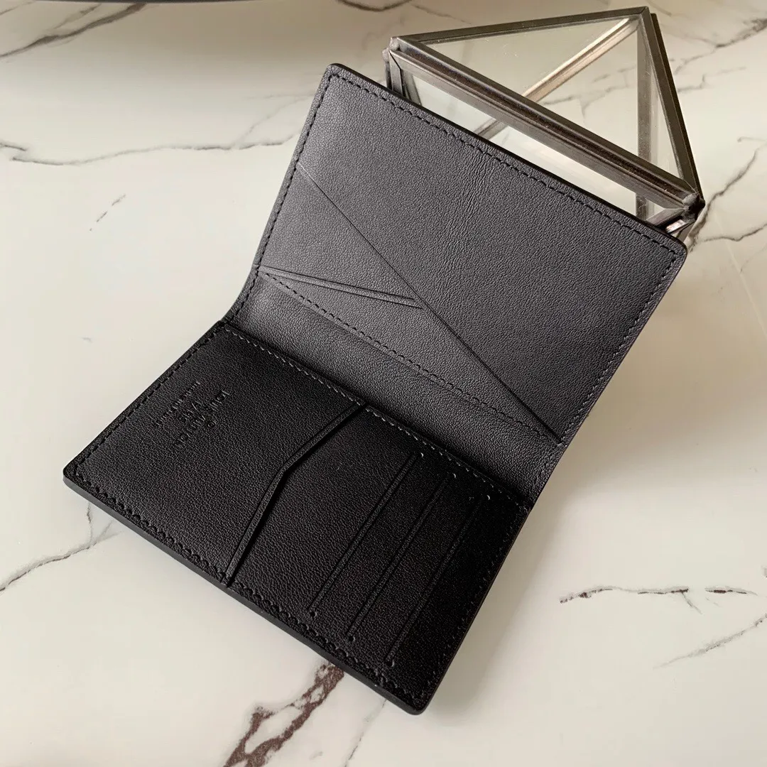 P¥220👉nfc dynamic chip version👈[Top-grade original pure steel hardware]💕 M58808 black full leather pebbled card holder inside and outside Made of extremely soft Taurillon leather, this Pocket Organizer pocket wallet is both fashionable and practical. It has multiple pockets and spaces. The design is compact and lightweight, but enough to accommodate credit cards, banknotes and other personal belongings.  Details 8 x 11 x 1 cm (length x height x width) Taurillon leather Cowhide lining 5 internal pockets 1 external pocket 3 credit card slots Cowhide lining