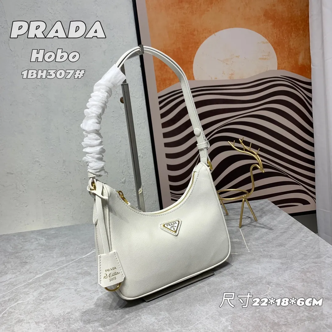 All Categories Official Website "Brand Women's Bags" Women's Bags 💙 PRADA Prada 2022 counter latest hobo women's full leather armpit bag 1BH307 is made of cross-grain cowhide imported from Italy, triangle brand metal hardware, equipped with a small tag keychain, 80 cm adjustable shoulder strap, single shoulder + crossbody + handheld multi-functional carrying method, cloth lining, 175 OEM code. size: