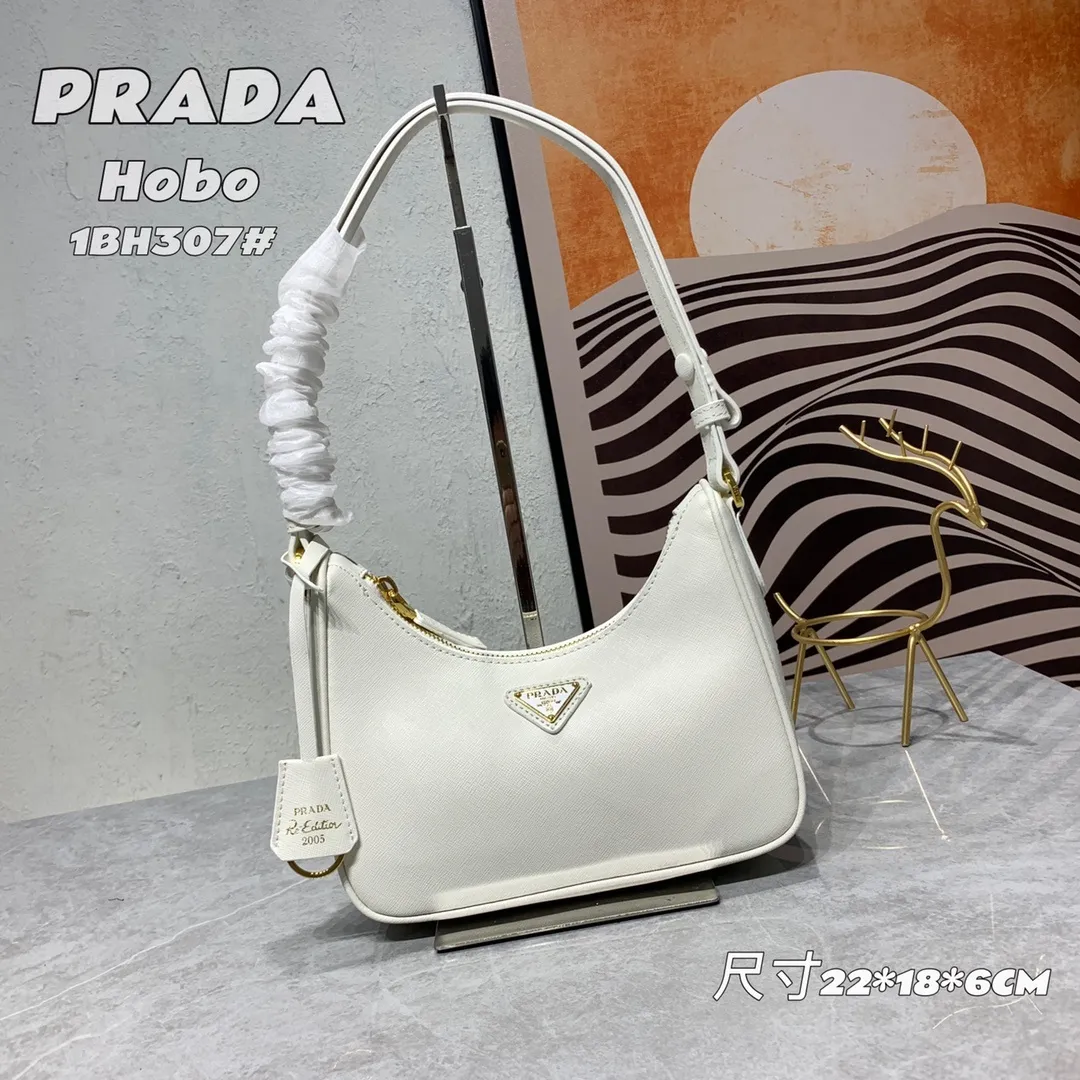 All Categories Official Website "Brand Women's Bags" Women's Bags 💙 PRADA Prada 2022 counter latest hobo women's full leather armpit bag 1BH307 is made of cross-grain cowhide imported from Italy, triangle brand metal hardware, equipped with a small tag keychain, 80 cm adjustable shoulder strap, single shoulder + crossbody + handheld multi-functional carrying method, cloth lining, 175 OEM code. size: