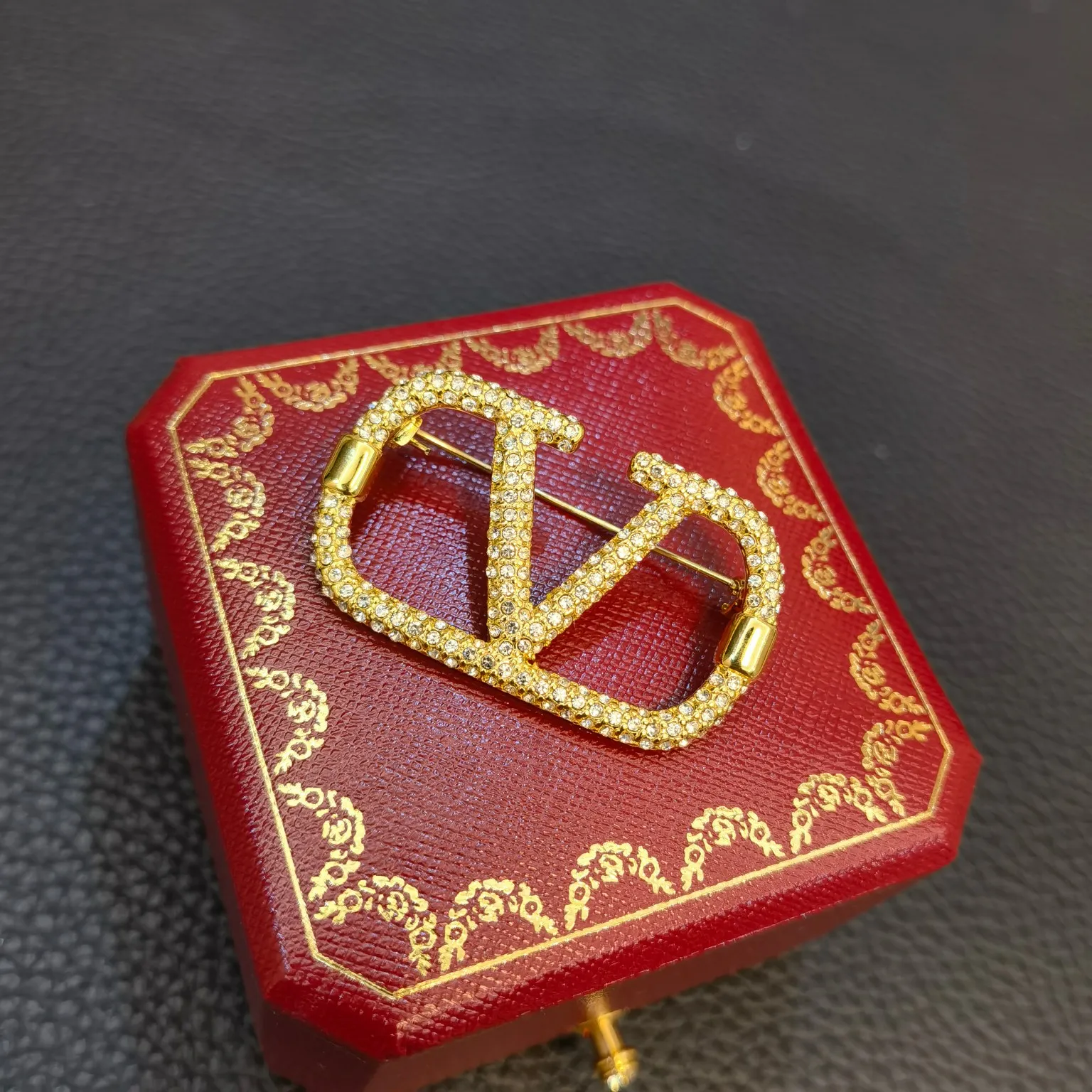 Valentino brooch