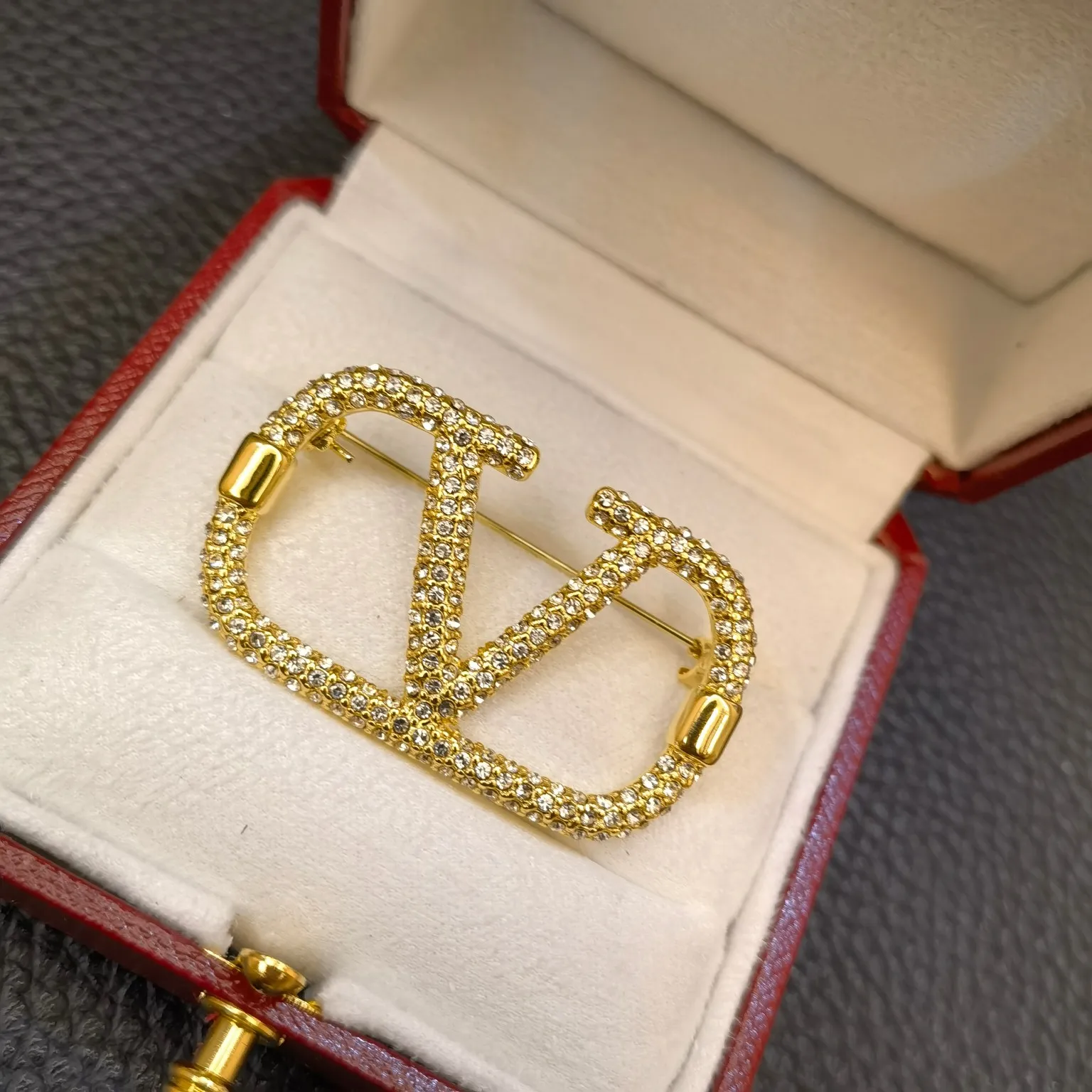 Valentino brooch