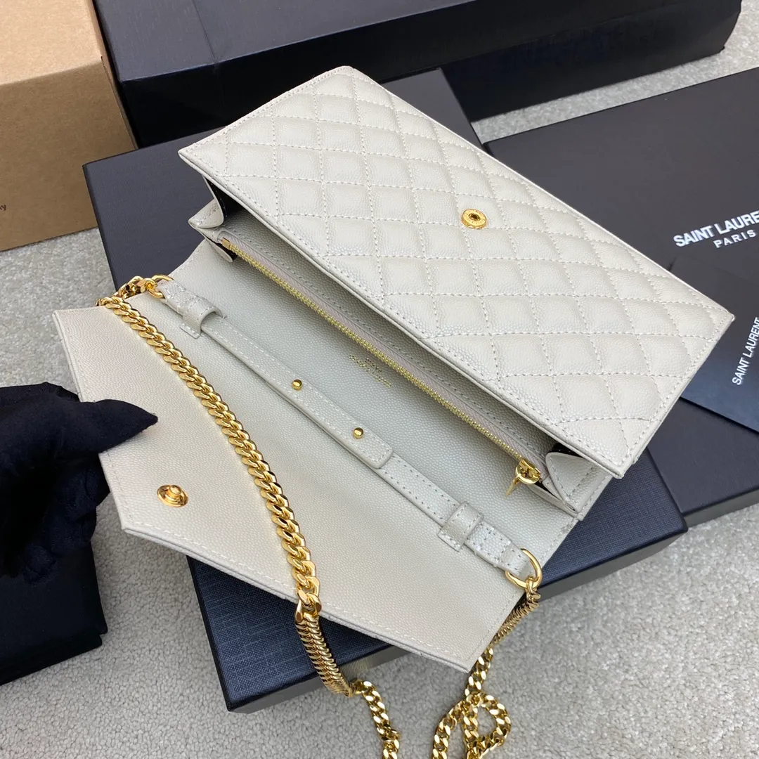 💰1300 white ball pattern/gold buckle 🌈YSL latest ENVELOPE Woc envelope bag ✉️Original caviar ball pattern, engraved inner zipper compartment, can be used as a clutch bag or as a shoulder bag. There are multiple card slots inside. Compact and practical 👍20220650 Model: 620280 [original leather] Size: 22.5x14x4cm
