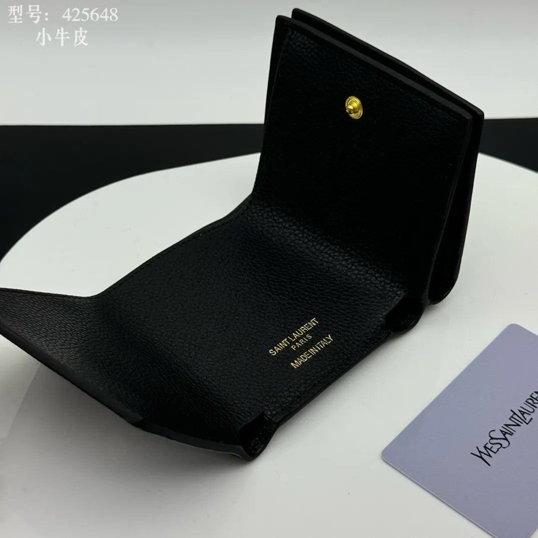 💰170 💎Top quality 💕 Full leather inside and outside "Saint Laurent" YSL 💌 Tri-fold small wallet Black leather grain gold Impressive mini wallet with metal YSL logo mounted on the leather ring. Gold Metal Accessories Shutter Button Closer Inside: Wallet 1 Card Slot x 3 Outside: Coin Pocket with Shutter Button x 1, Dimensions: 9.5 X 7 X 3 CM, Style No.: 425648