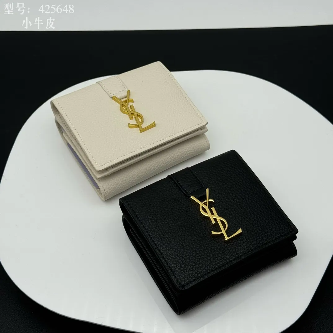 💰170 💎Top quality 💕 Full leather inside and outside "Saint Laurent" YSL 💌 Tri-fold small wallet Black leather grain gold Impressive mini wallet with metal YSL logo mounted on the leather ring. Gold Metal Accessories Shutter Button Closer Inside: Wallet 1 Card Slot x 3 Outside: Coin Pocket with Shutter Button x 1, Dimensions: 9.5 X 7 X 3 CM, Style No.: 425648
