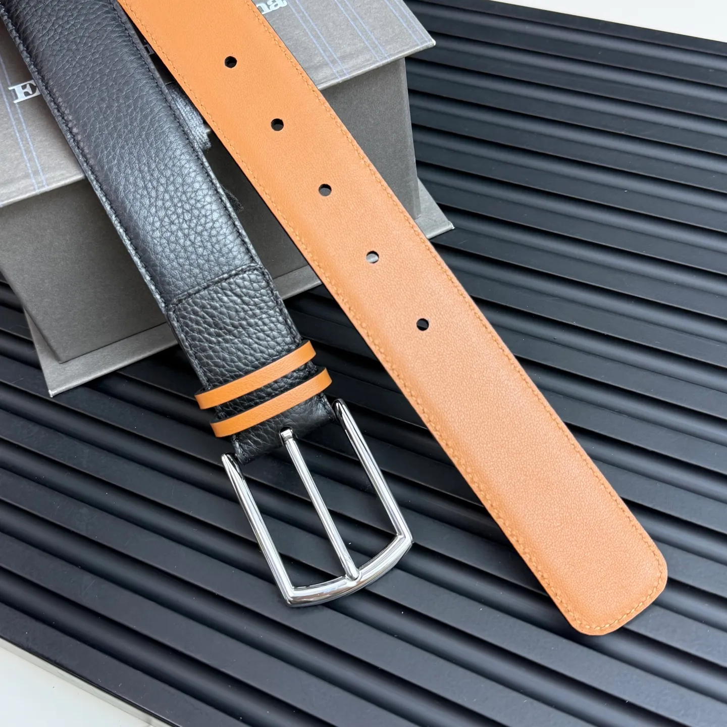 💰480💰Complete package💰 💍Purchase grade Ermenegildo Zegna This belt is made of grained leather with a rustic texture. Triple Stitch™ buckle features a glossy jet black finish for a stylish monochromatic effect. The buckle is embellished with the signature XXX stitch for added brand flair. Product code LHCEO-B014BZ-NER