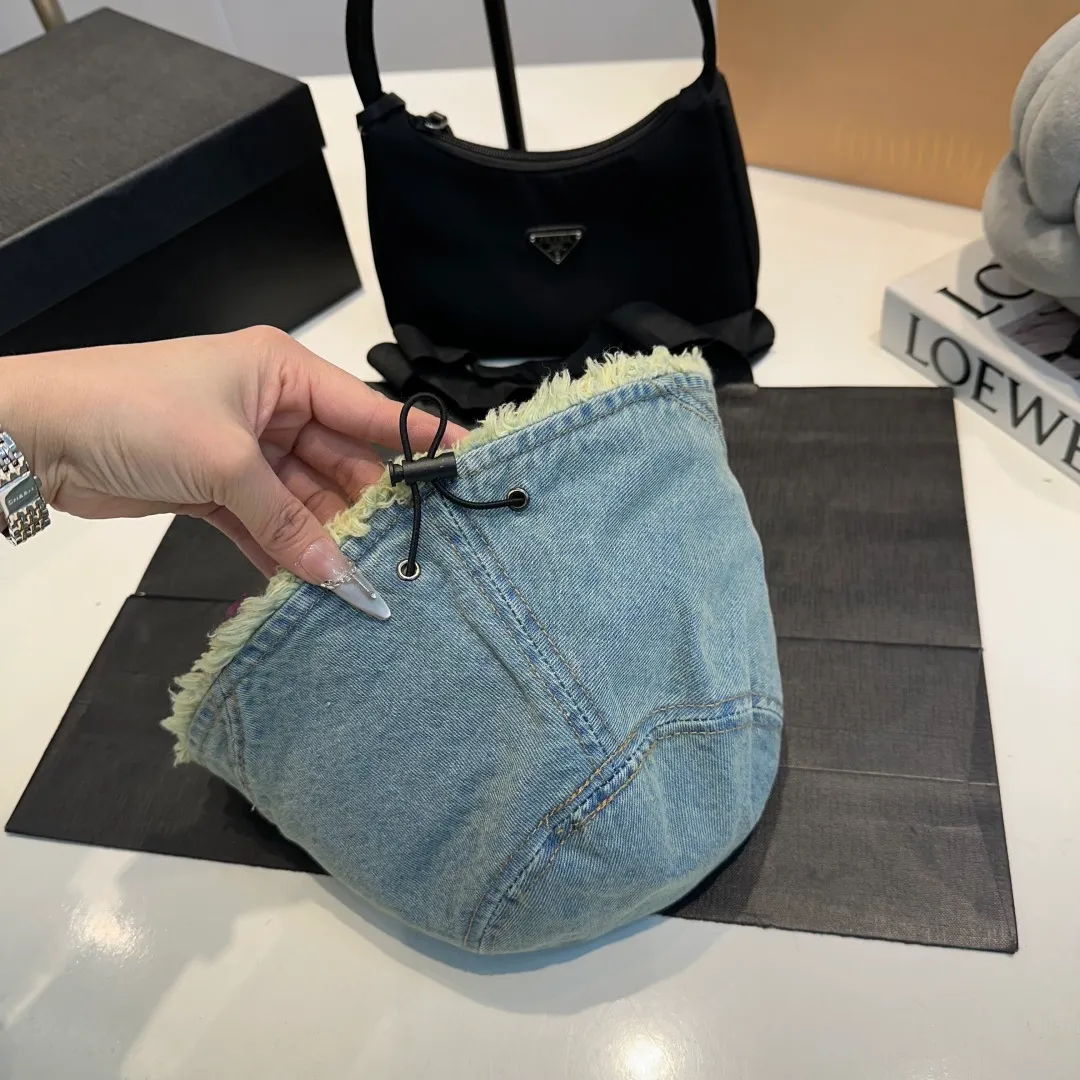 P70 Balenciaga denim bucket hat, head circumference 57cm