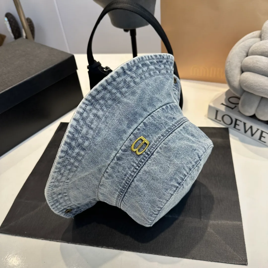 P70 Balenciaga denim bucket hat, head circumference 57cm