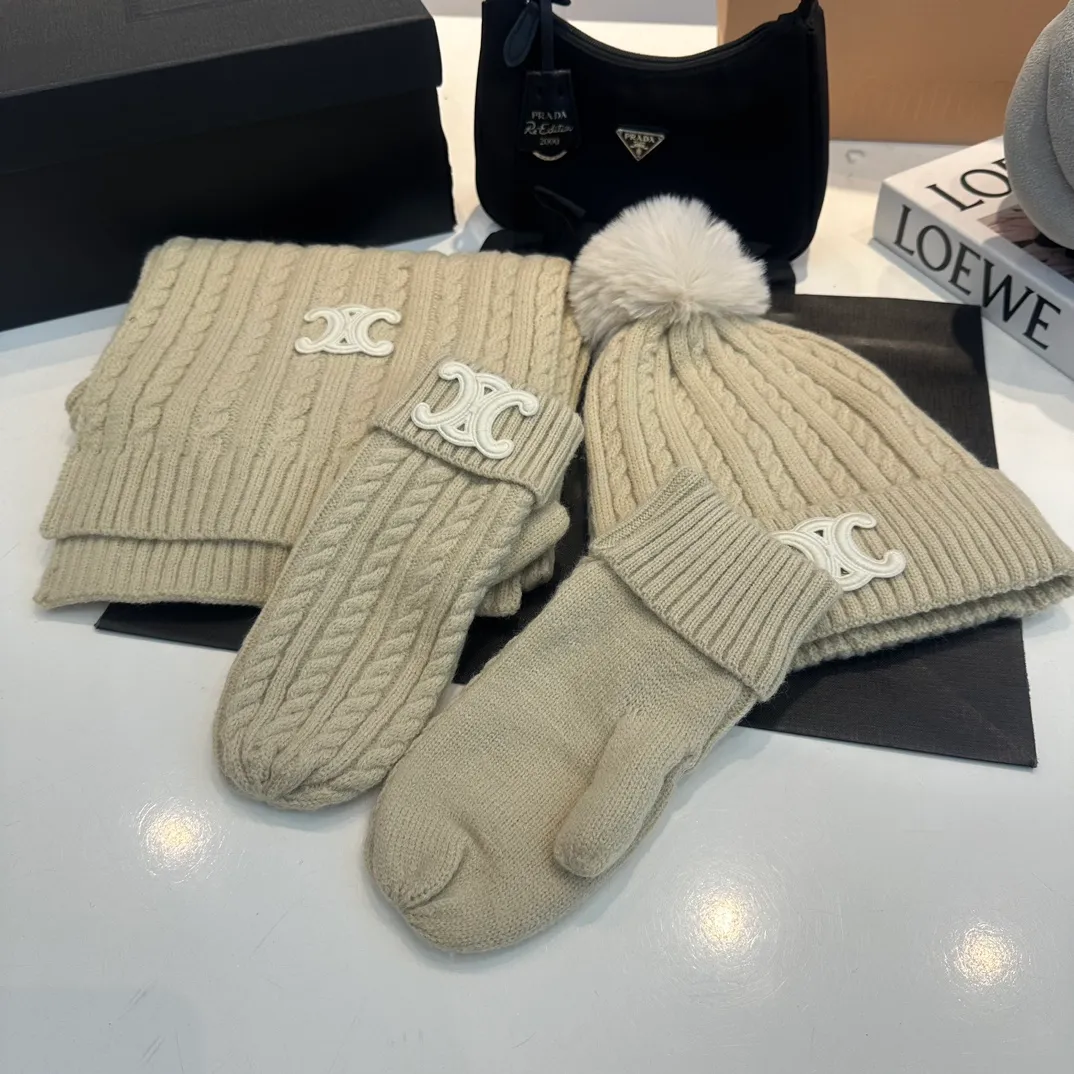 P190 CELINE [Wool Suit Scarf + Gloves + Hat -] Classic suit hat wool cashmere knitted hat with gloves, warm and super comfortable for winter. Celine's three-piece set of gloves, scarves and hats is so high-end. It feels particularly delicate, with impeccable texture and quality. The details are also handled very well. It's warm and comfortable. It's a magical tool for young ladies to reduce their age. Warm and fashionable! Scarf: 185/35cm, head circumference around 57cm, contains 70% wool fabric, complete internal standards.  The latest technology, one-piece molding, is super beautiful. The autumn and winter wool knitted beanie feels good to the touch ~ the color is super white ~ and it has a good atmosphere when taking photos. Multiple colors are matched and very versatile ~