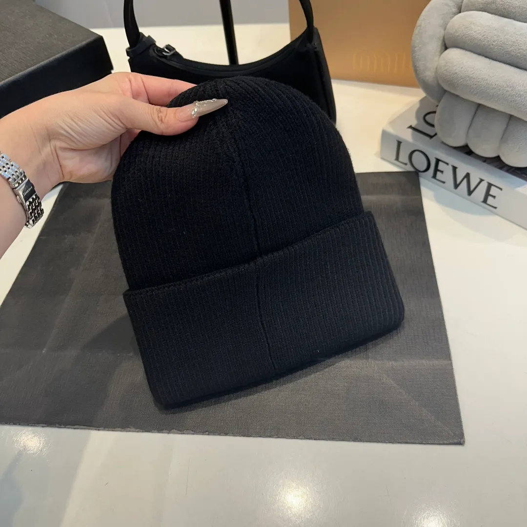P70 Chanel knitted beanie, new counter model