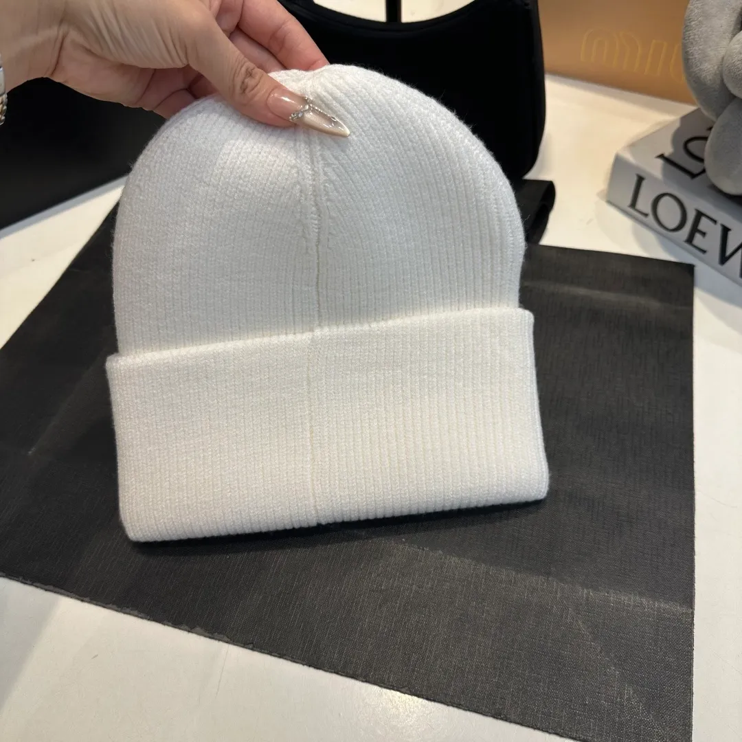P70 Chanel knitted beanie, new counter model