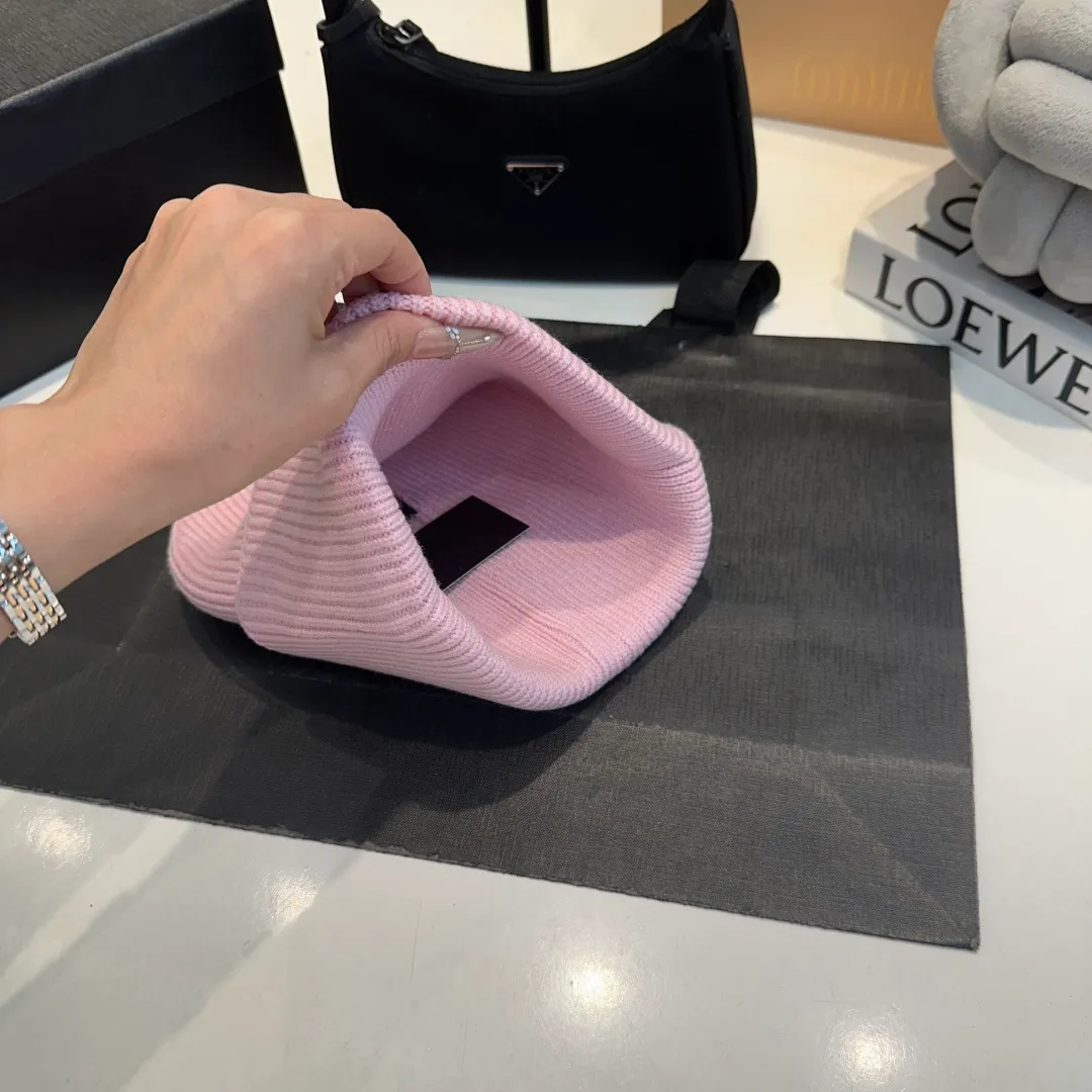P70 Chanel knitted beanie, new counter model