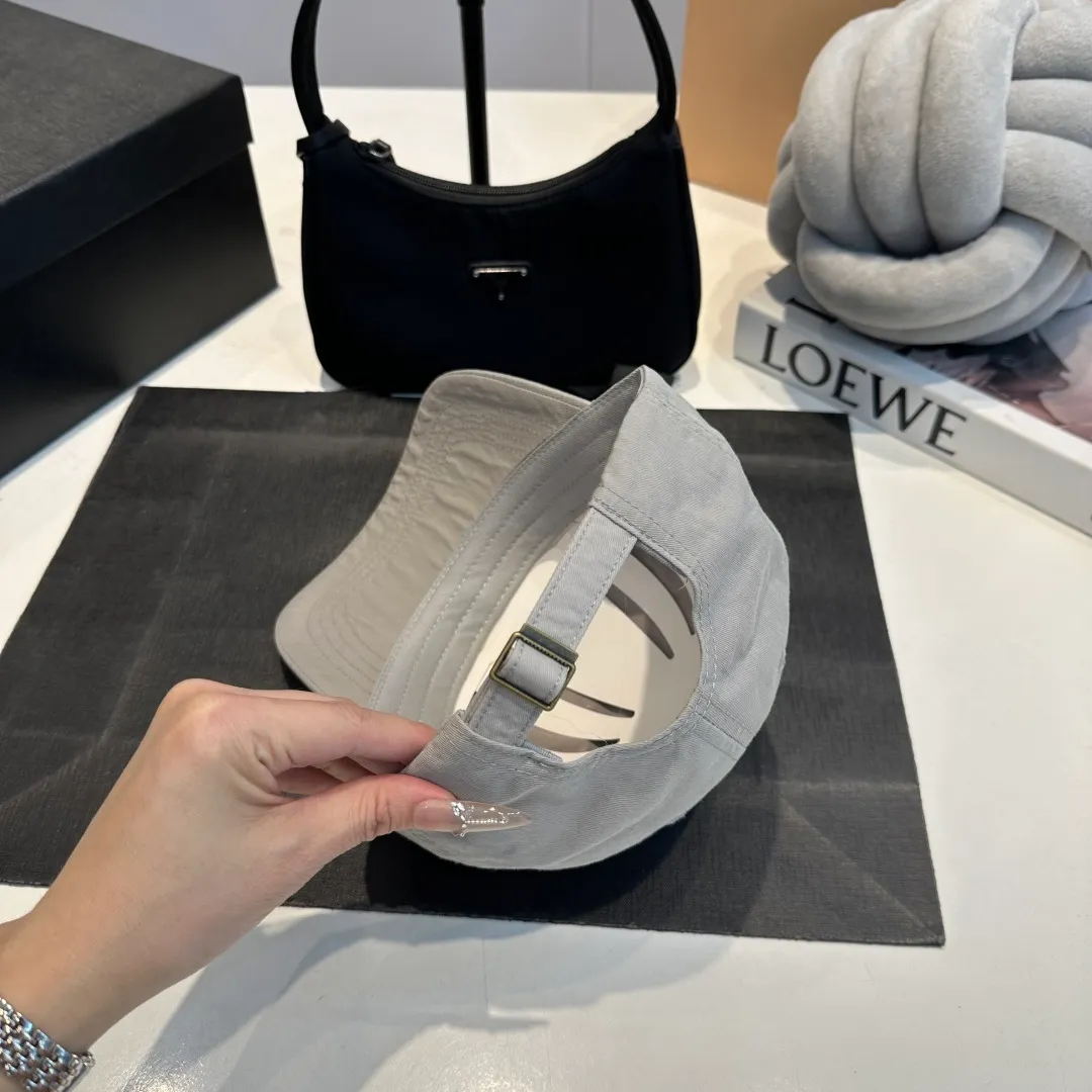 P60 Chanel Chanel 25 spring and summer new hole baseball cap, personalized broken corner brim design is full of sense