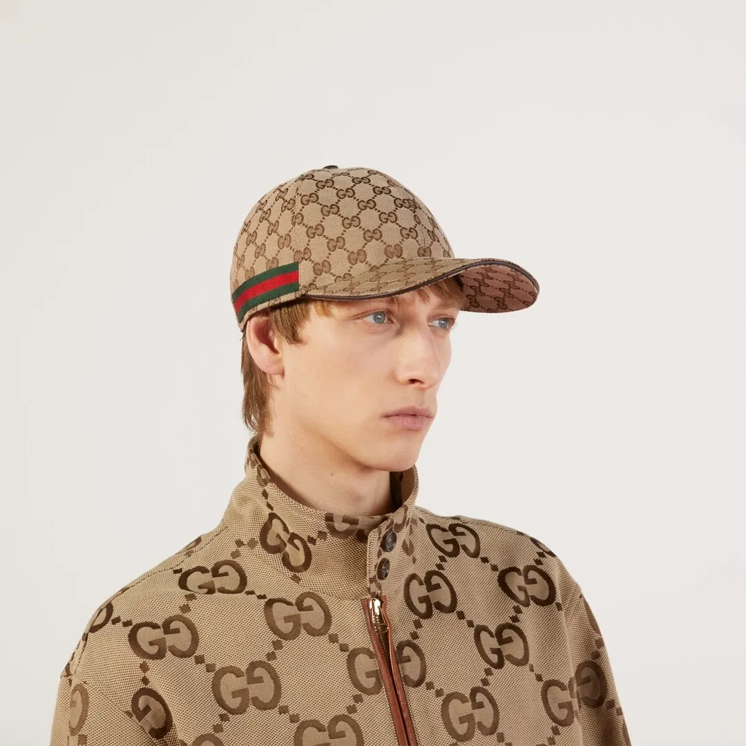 P240 This single product is from the Gucci Lido series, and its design is inspired by the summer style and beach clubs of the Italian coast. Classic baseball cap shape, made of OriginalGG canvas and decorated with webbing details. After the webbing was introduced by Gucci design in the 1950s, it quickly became popular and became a symbol of cultural class. GG patterned canvas with black leather details Cotton lining Adjustable buckle at the rear 68% polyester, 16% cotton, 16% nylon; 100% nylon (details); 100% cotton (lining); 50% cotton, 50% viscose (lining); Contains non-textile materials of animal origin · Made in Italy