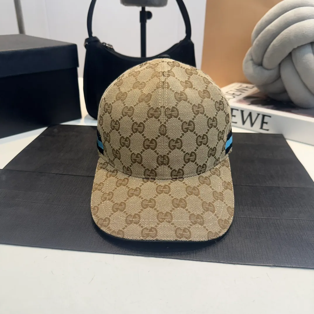 P240 This single product is from the Gucci Lido series, and its design is inspired by the summer style and beach clubs of the Italian coast. Classic baseball cap shape, made of OriginalGG canvas and decorated with webbing details. After the webbing was introduced by Gucci design in the 1950s, it quickly became popular and became a symbol of cultural class. GG patterned canvas with black leather details Cotton lining Adjustable buckle at the rear 68% polyester, 16% cotton, 16% nylon; 100% nylon (details); 100% cotton (lining); 50% cotton, 50% viscose (lining); Contains non-textile materials of animal origin · Made in Italy