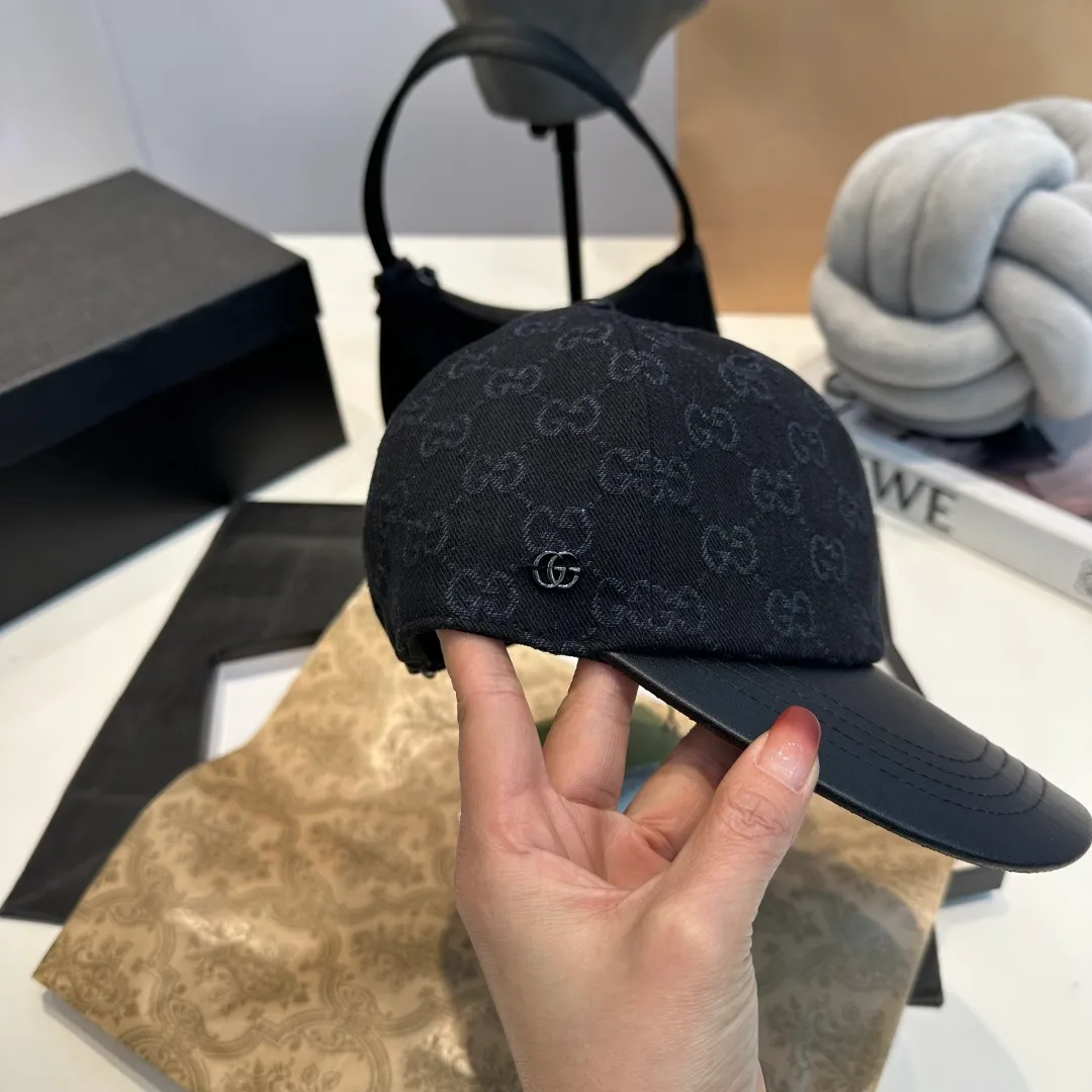P240 Gucci Baseball Cap🧢Gucci’s classic pattern shines in this fashionable item embellished with the brand’s logo. This baseball cap is crafted from the brand's recognizable GG canvas fabric, with tonal leather details and an adjustable buckle adding to the appeal. Product details ·Pink GG canvas ·Pink leather piping ·Cotton and linen lining ·Adjustable Velcro closure ·70% cotton, 30% polyester; 65% cotton, 35% linen (lining); 55% cotton, 45% viscose (inside); Cow leather (detail); Cow leather (leather piping)