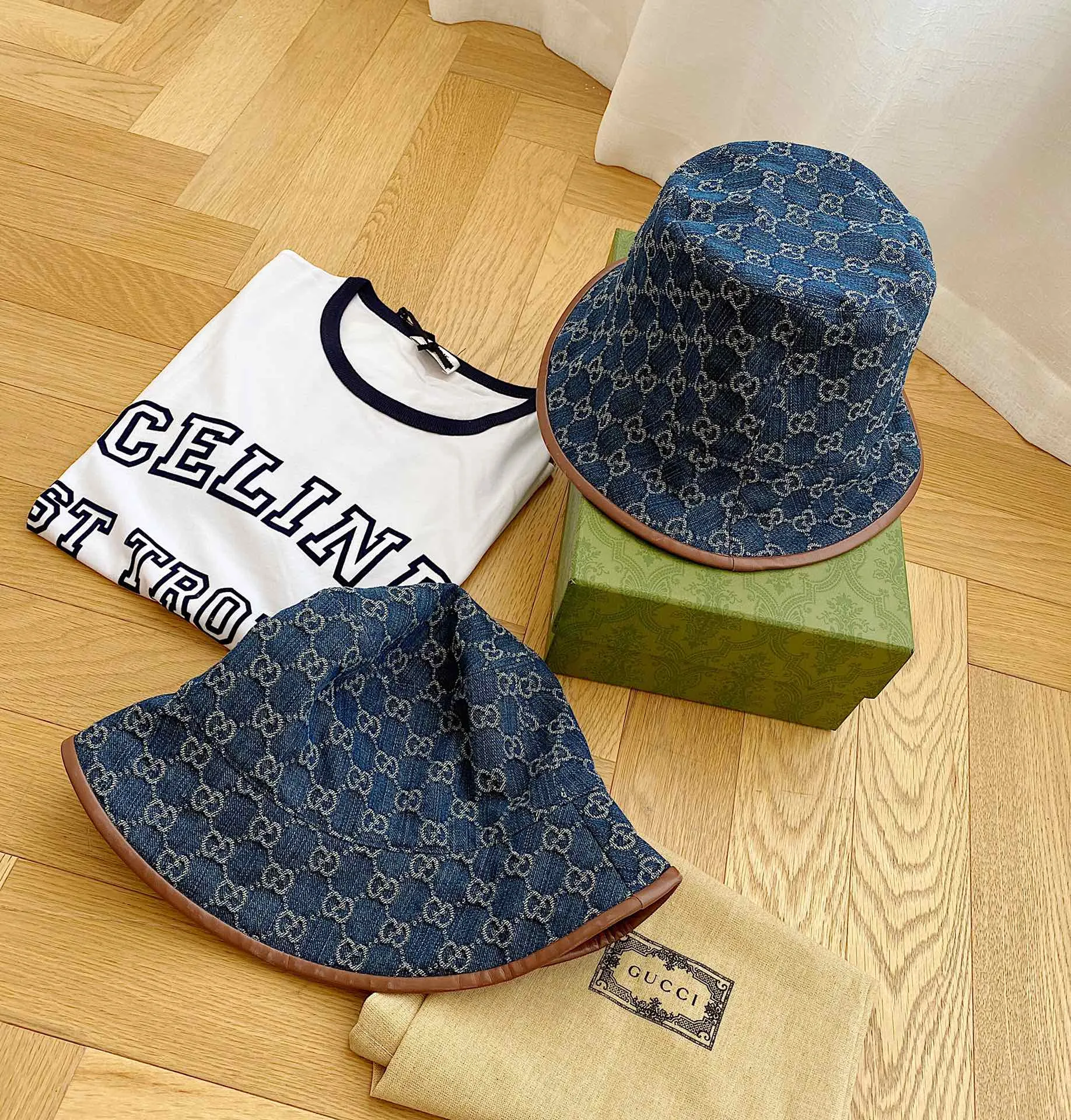 Special batch of 100 (high version) Gucci/2021 The most popular fisherman hat at the moment. The high version is now shipping. Upgraded version. New denim jacquard fisherman hat basin hat for men and women. The hat body is made of denim fabric. Jacquard craftsmanship. Retro design. The market version is full of trend elements from the inside to the outside. The full logo brings fashion to the extreme. Wear it when you go out. The number of heads turning is only for you. There is a hat logo inside the hat and fine workmanship. There is no doubt that the quality of the original item is full of fashion and high-end sense.